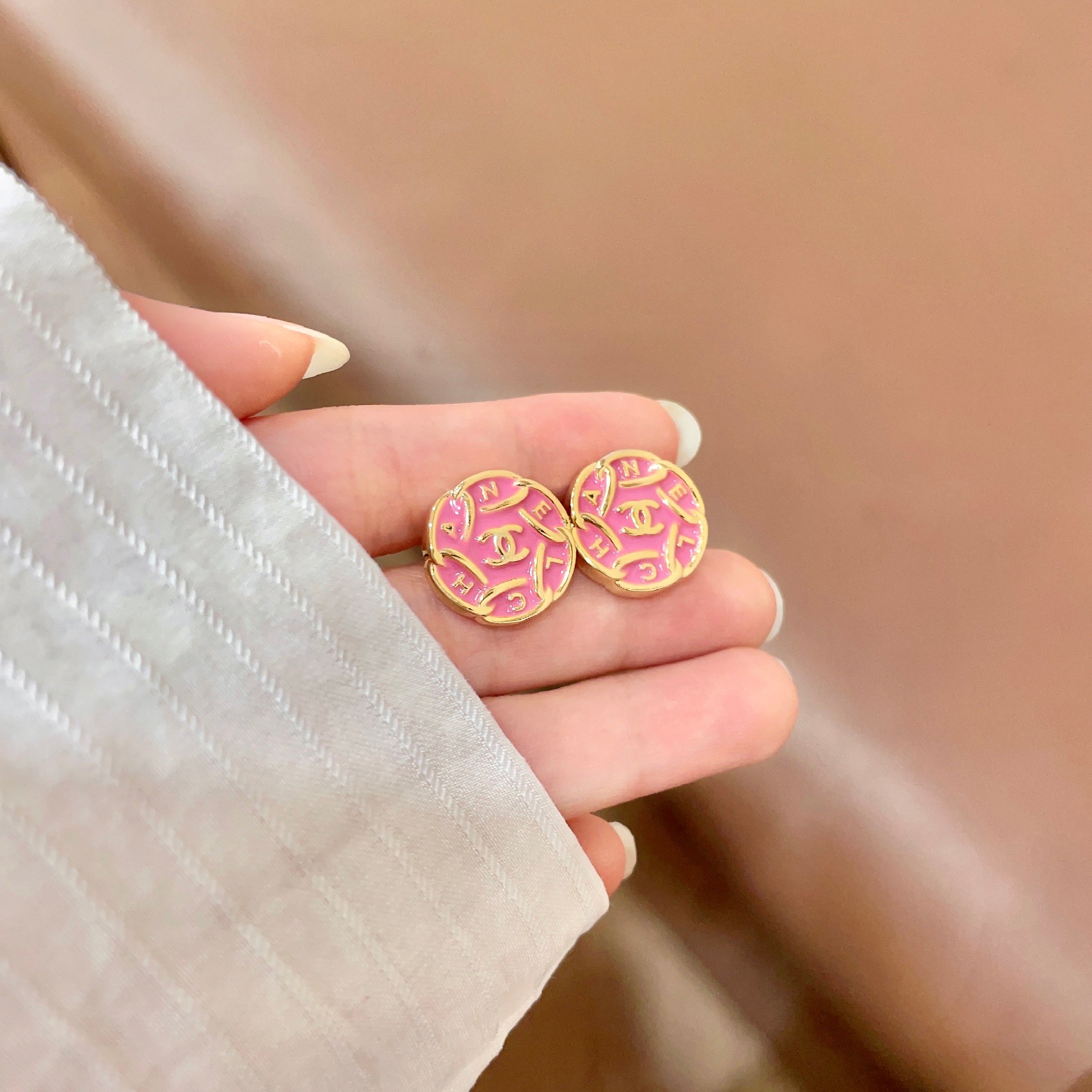 Chanel CC Logo Round Enamel Stud Earrings earrings gold-tone metal with bright pink enamel 1 2cm diameter