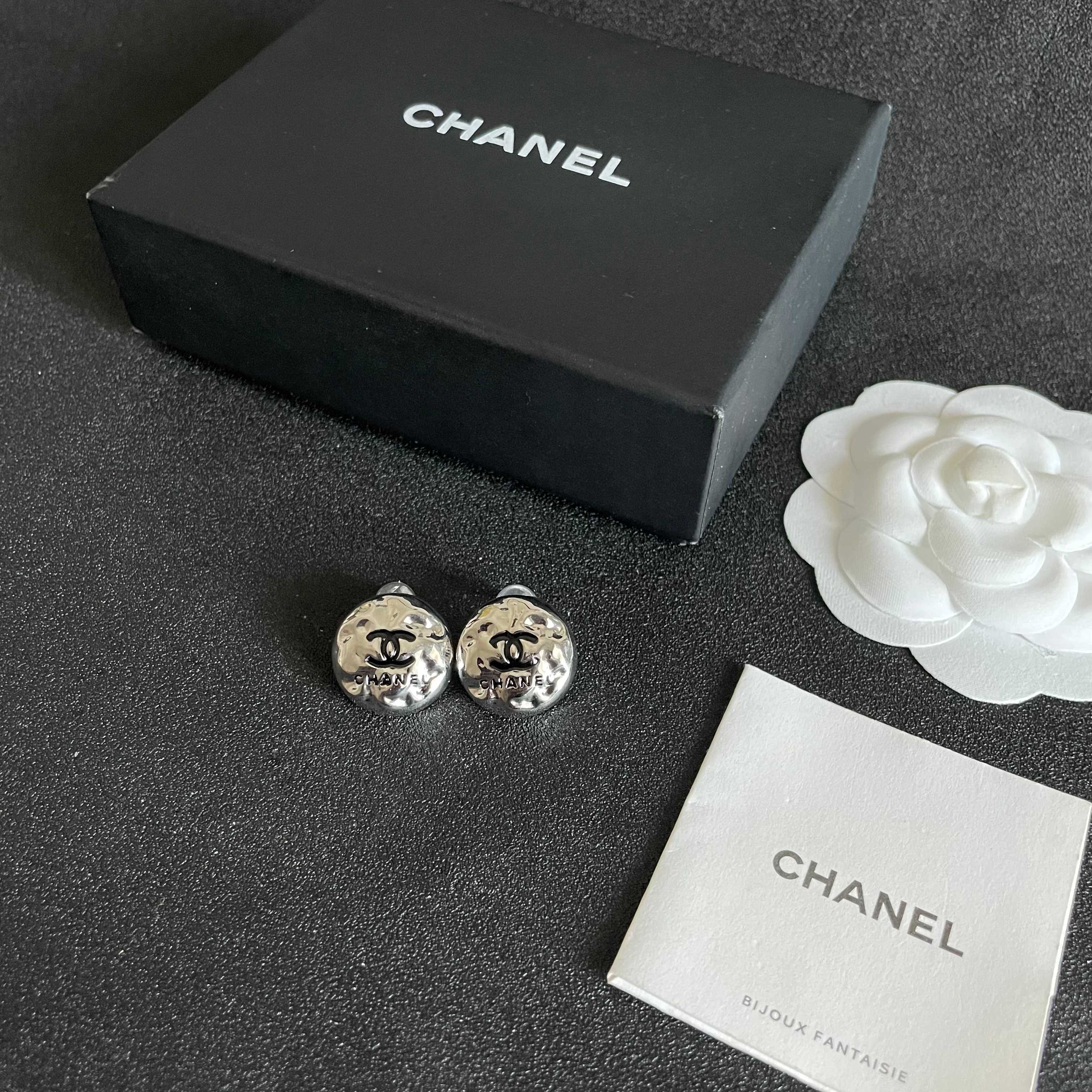 Chanel CC Logo Hammered Dome Stud Earrings earrings Silver-tone metal with black enamel CC logo detailing 1 5cm diameter