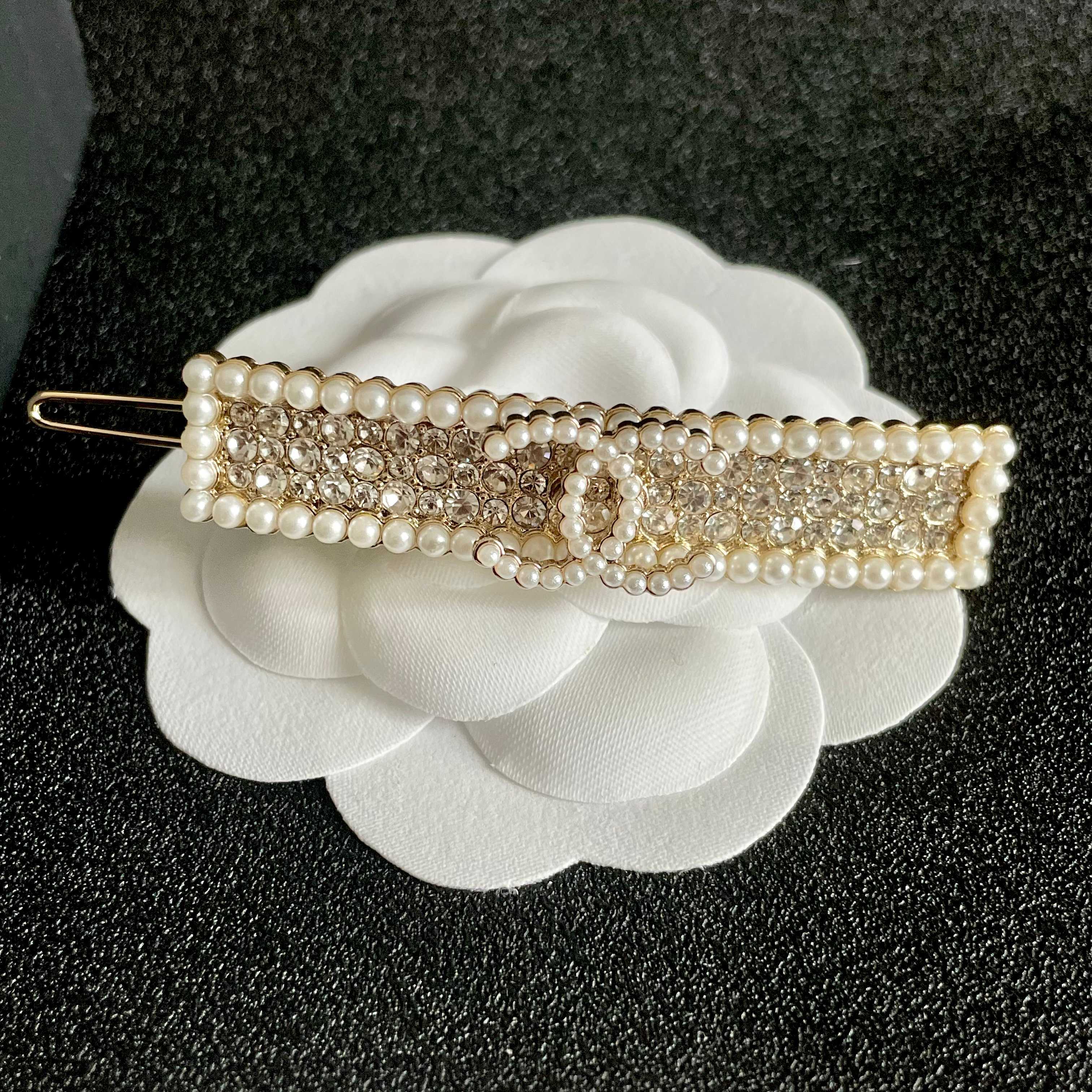 Chanel CC Logo Pearl Crystal Barrette brooch Gold-tone metal cream faux pearl clear crystal 6cm