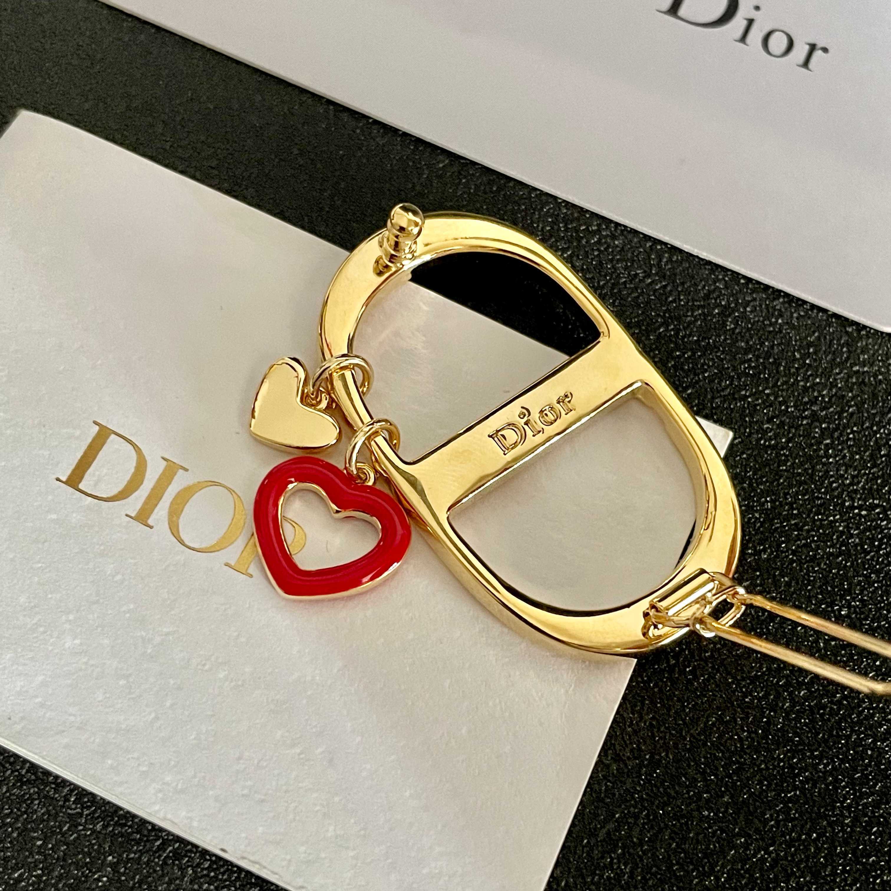 Dior CD Logo Heart Charm Hair Clip brooch gold-tone metal with red enamel heart charm 3 5cm