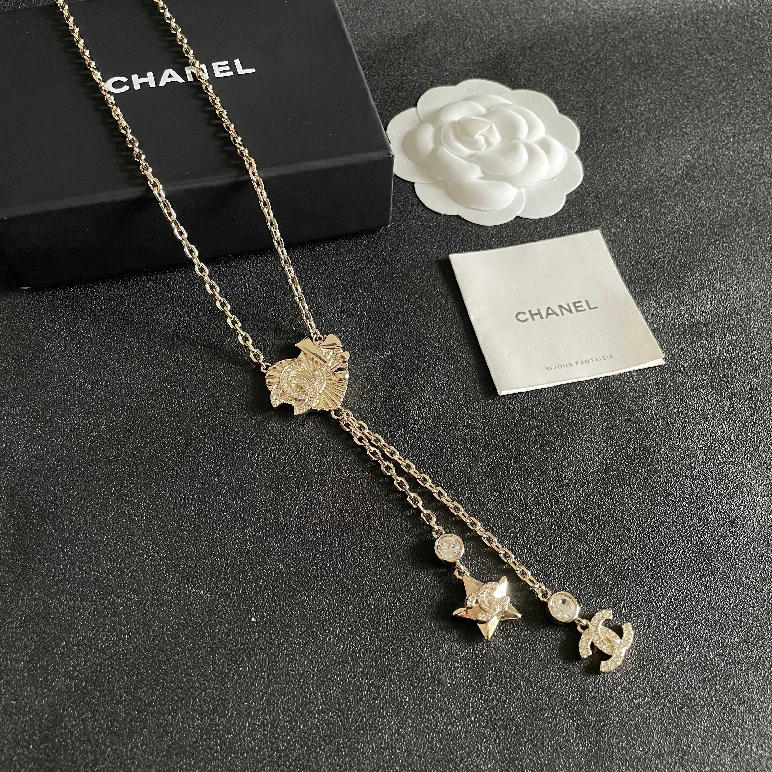 Chanel CC Heart Star Lariat necklace light gold metal with clear crystal accents 42cm