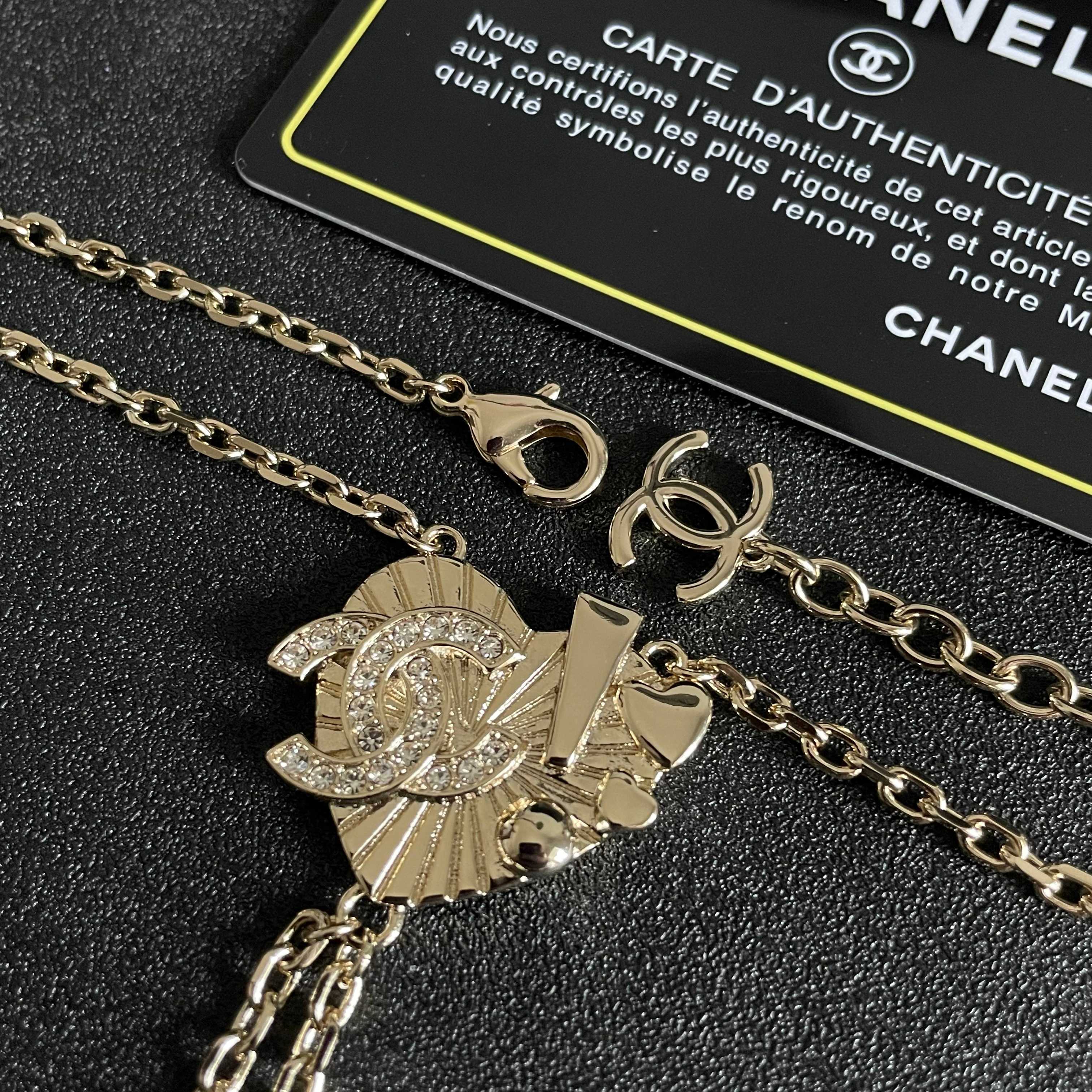 Chanel CC Heart Star Lariat necklace light gold metal with clear crystal accents 42cm