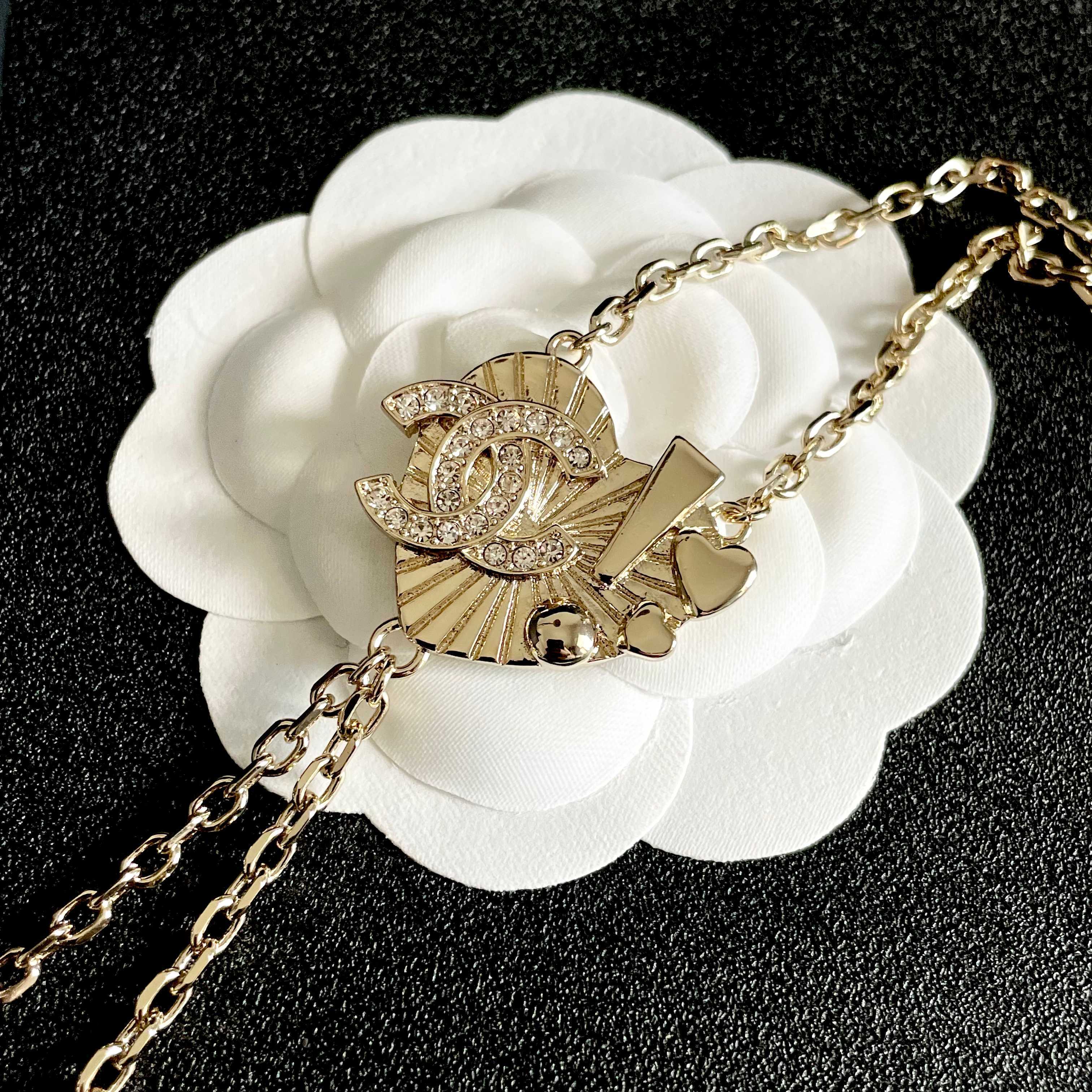 Chanel CC Heart Star Lariat necklace light gold metal with clear crystal accents 42cm
