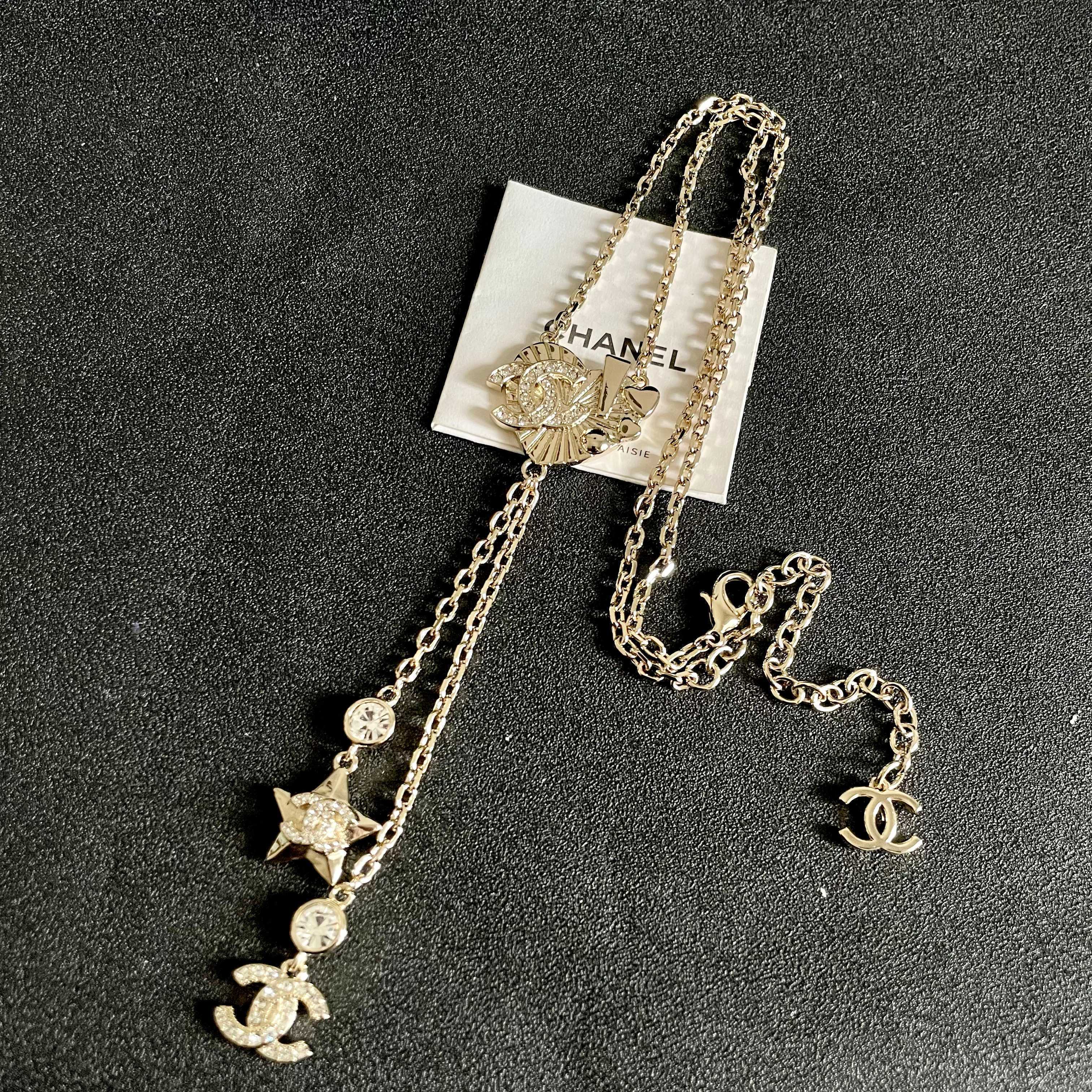 Chanel CC Heart Star Lariat necklace light gold metal with clear crystal accents 42cm