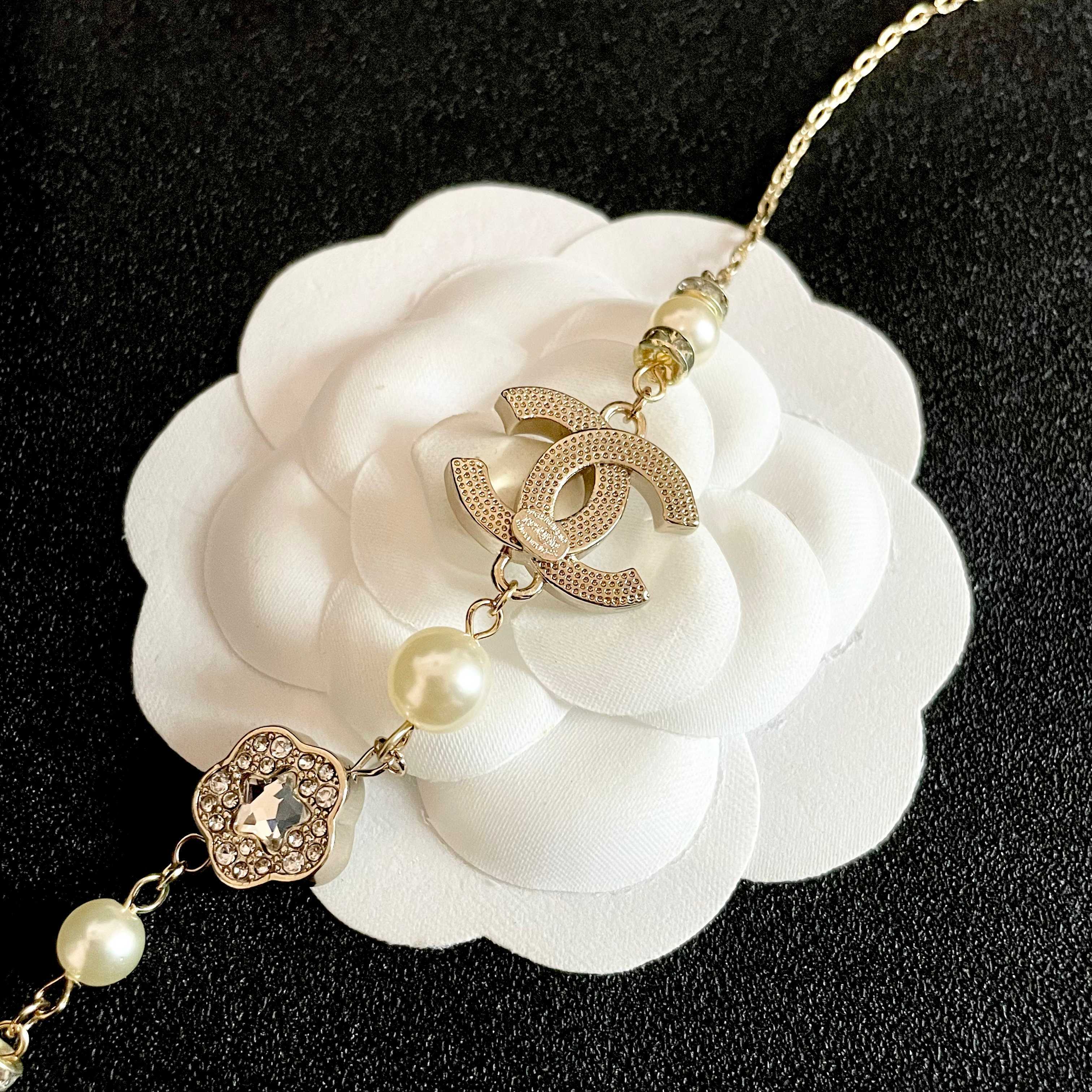 Chanel CC Camellia Pearl Crystal Necklace necklace Gold-tone metal cream faux pearl clear crystal 42cm