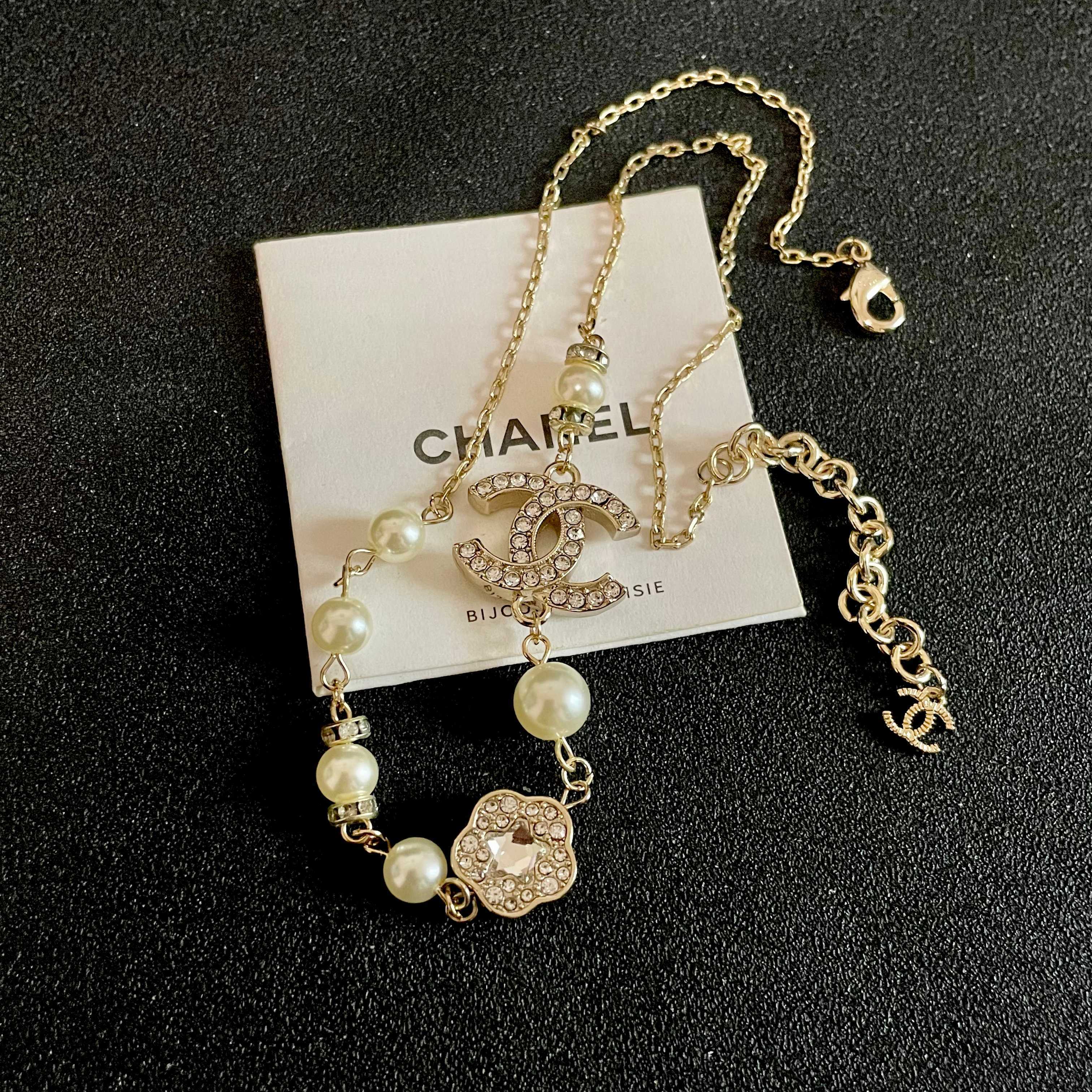 Chanel CC Camellia Pearl Crystal Necklace necklace Gold-tone metal cream faux pearl clear crystal 42cm