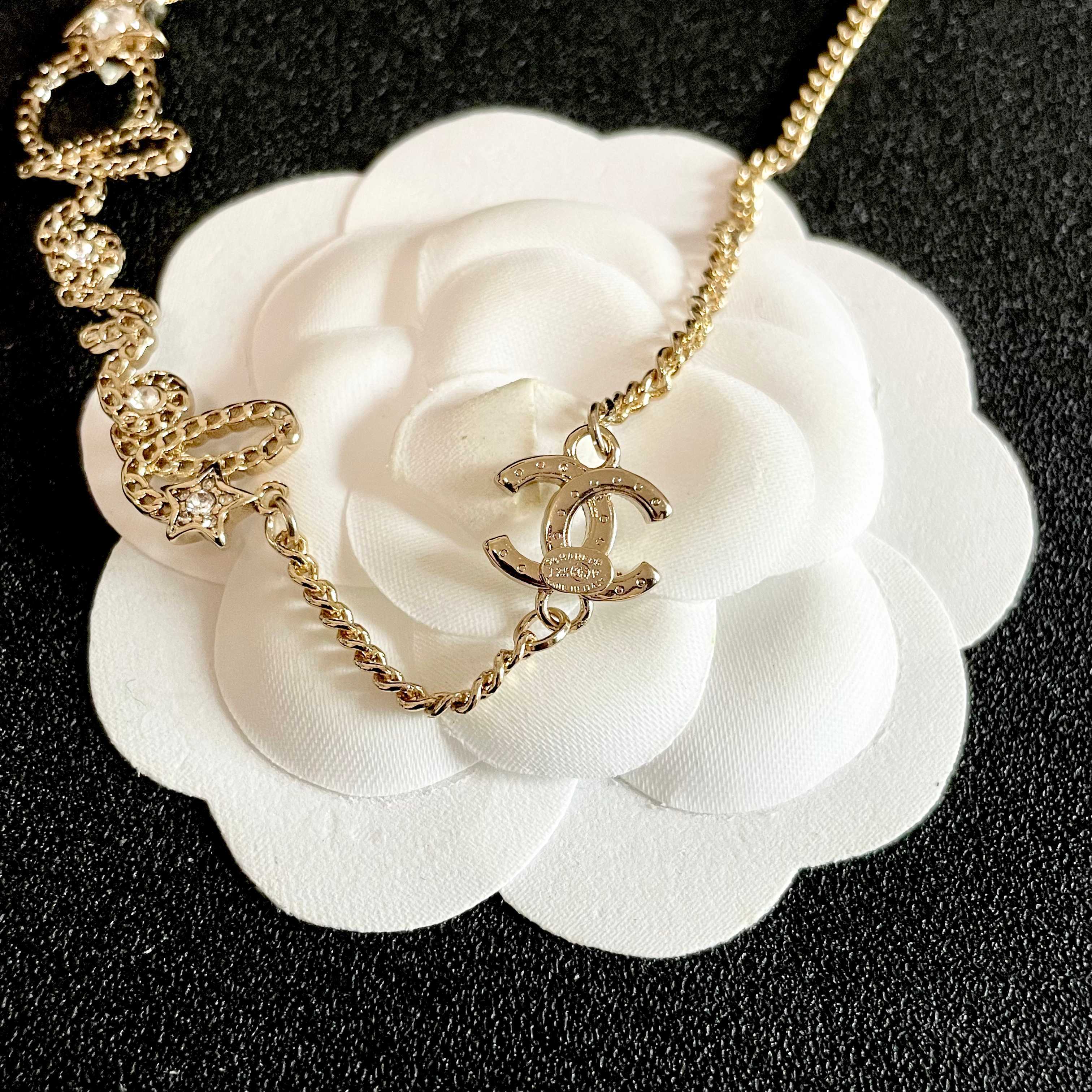 Chanel Script Logo Star Crystal CC Necklace necklace Gold-tone metal with clear crystal accents 42cm