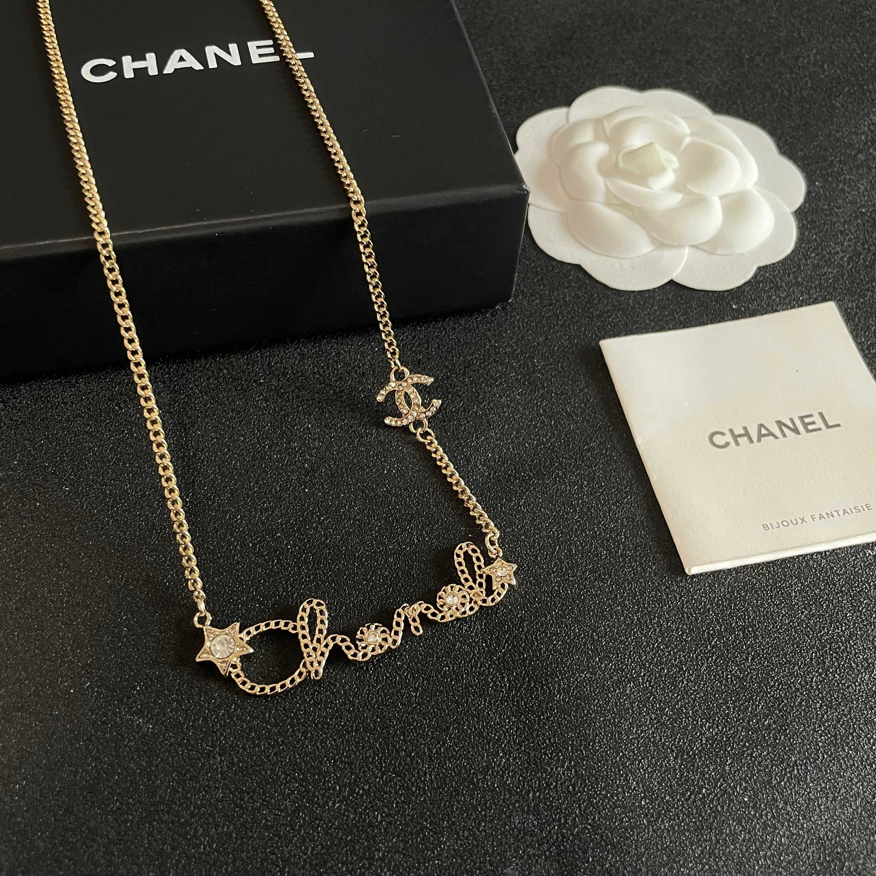 Chanel Script Logo Star Crystal CC Necklace necklace Gold-tone metal with clear crystal accents 42cm