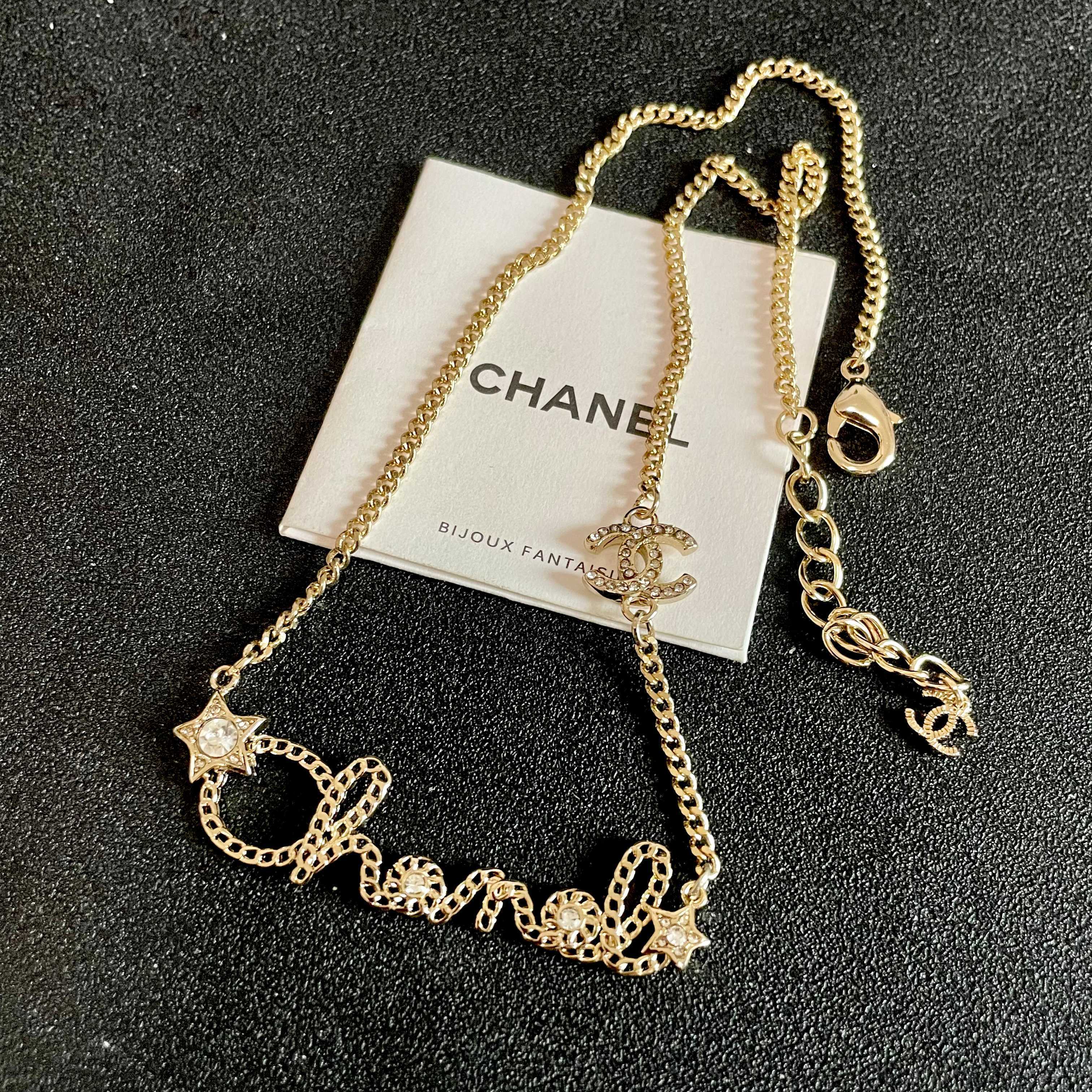 Chanel Script Logo Star Crystal CC Necklace necklace Gold-tone metal with clear crystal accents 42cm