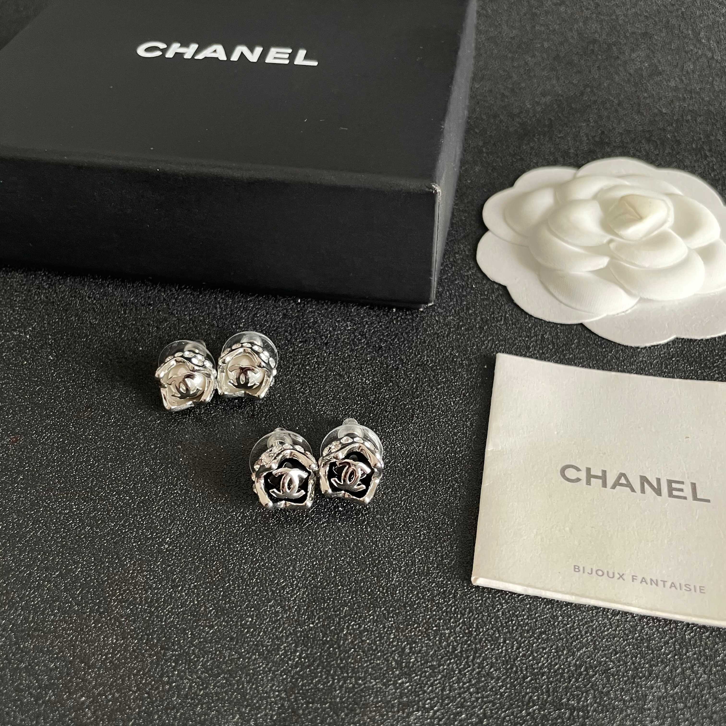 Chanel CC Logo Round Stud Earrings earrings Silver-tone metal with black enamel and silver interlocking CC logo 1cm diameter