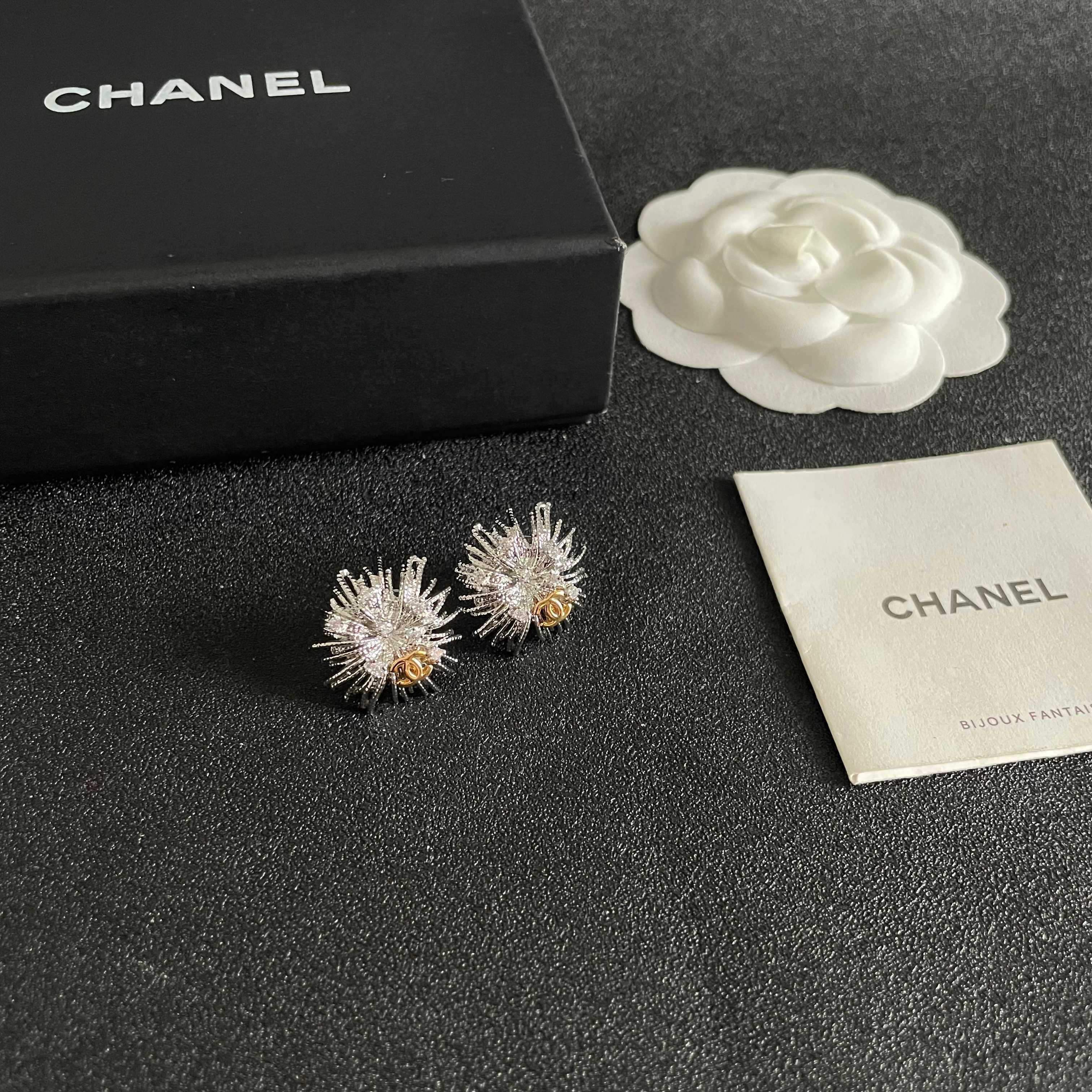 Chanel CC Sunburst Stud Earrings earrings silver-tone metal with clear crystal accents and gold-tone CC logo 1 5cm diameter