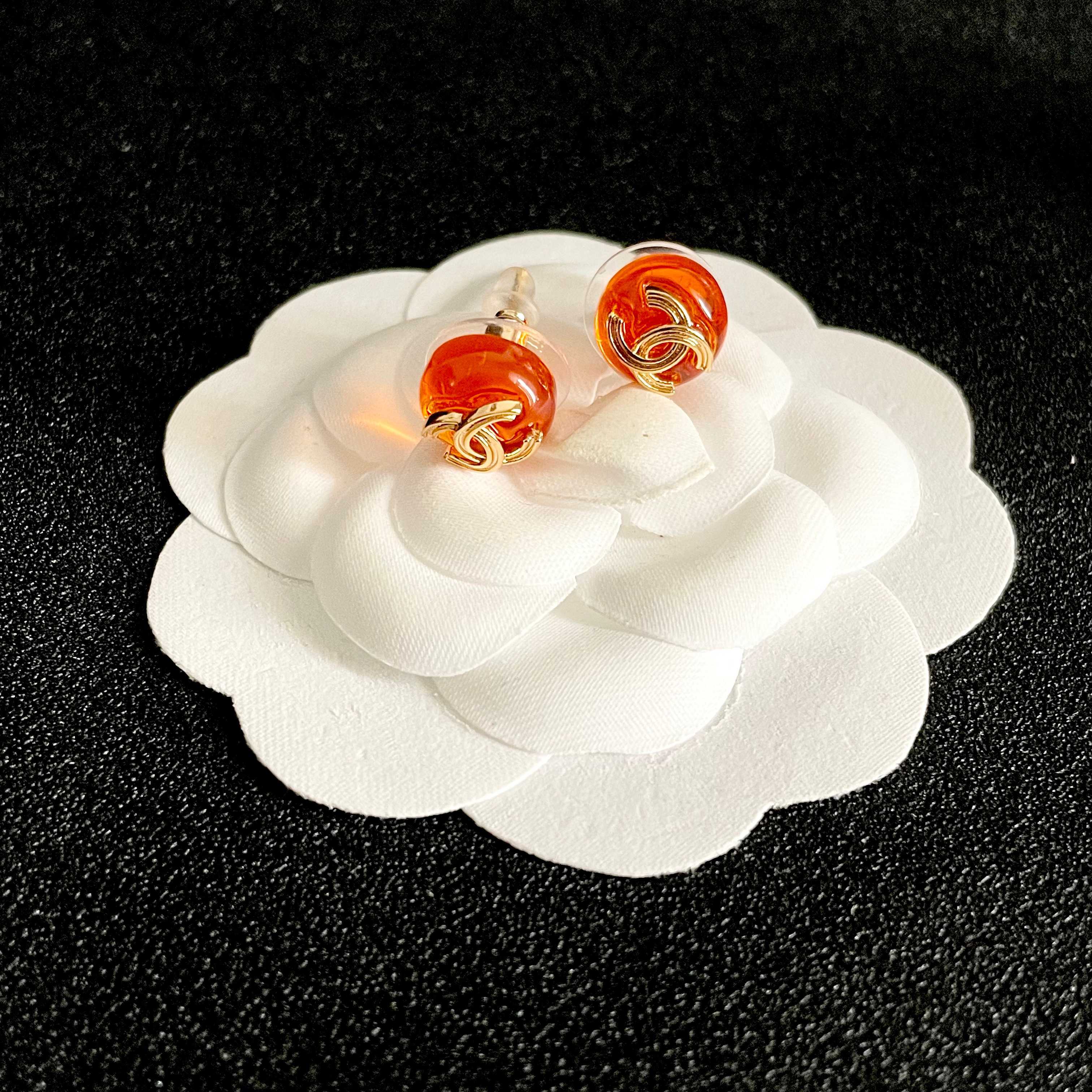 Chanel CC Logo Round Stud Earrings earrings gold-tone metal translucent orange resin 1 2cm diameter