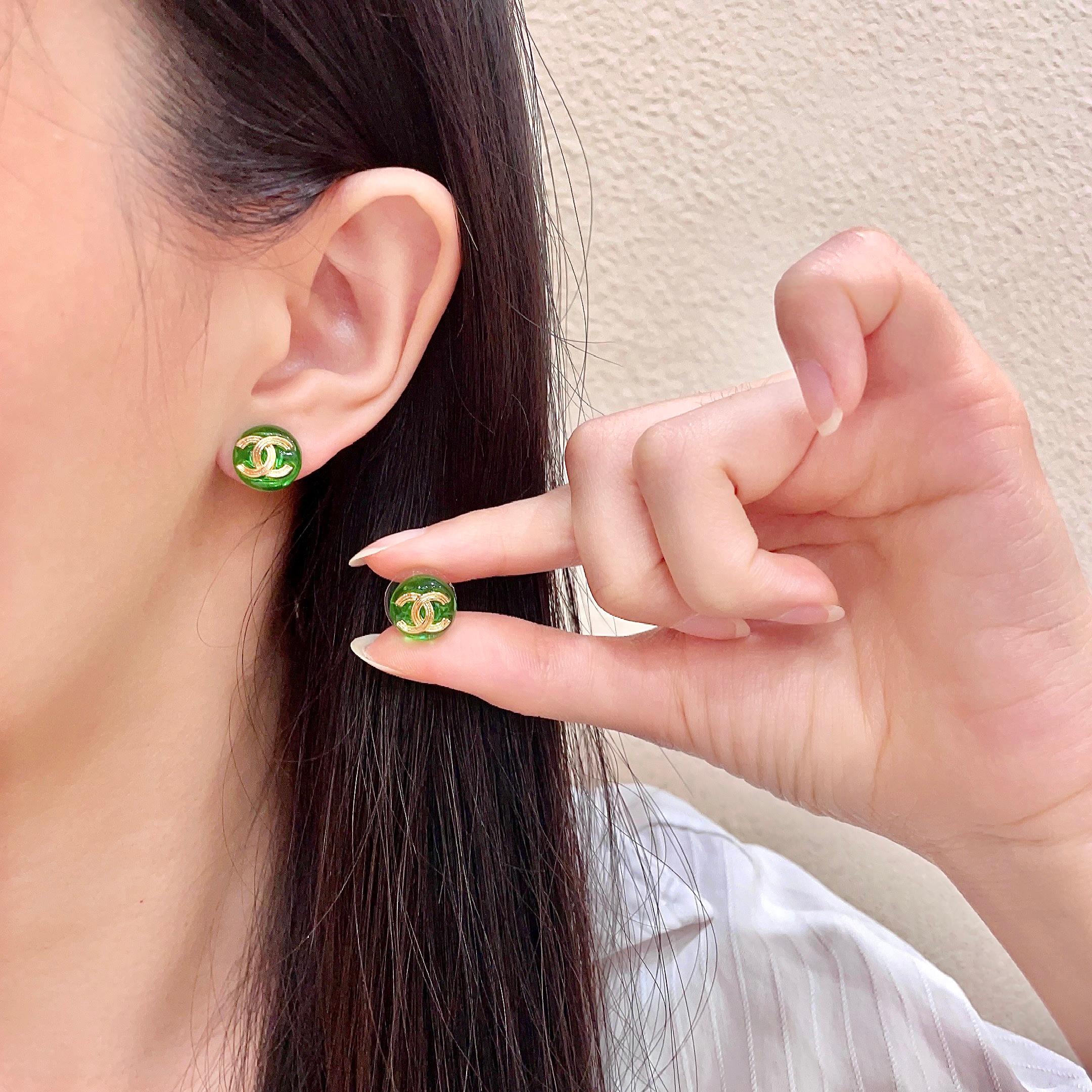 Chanel CC Logo Round Resin Stud Earrings earrings gold-tone metal translucent green resin 1 2cm diameter