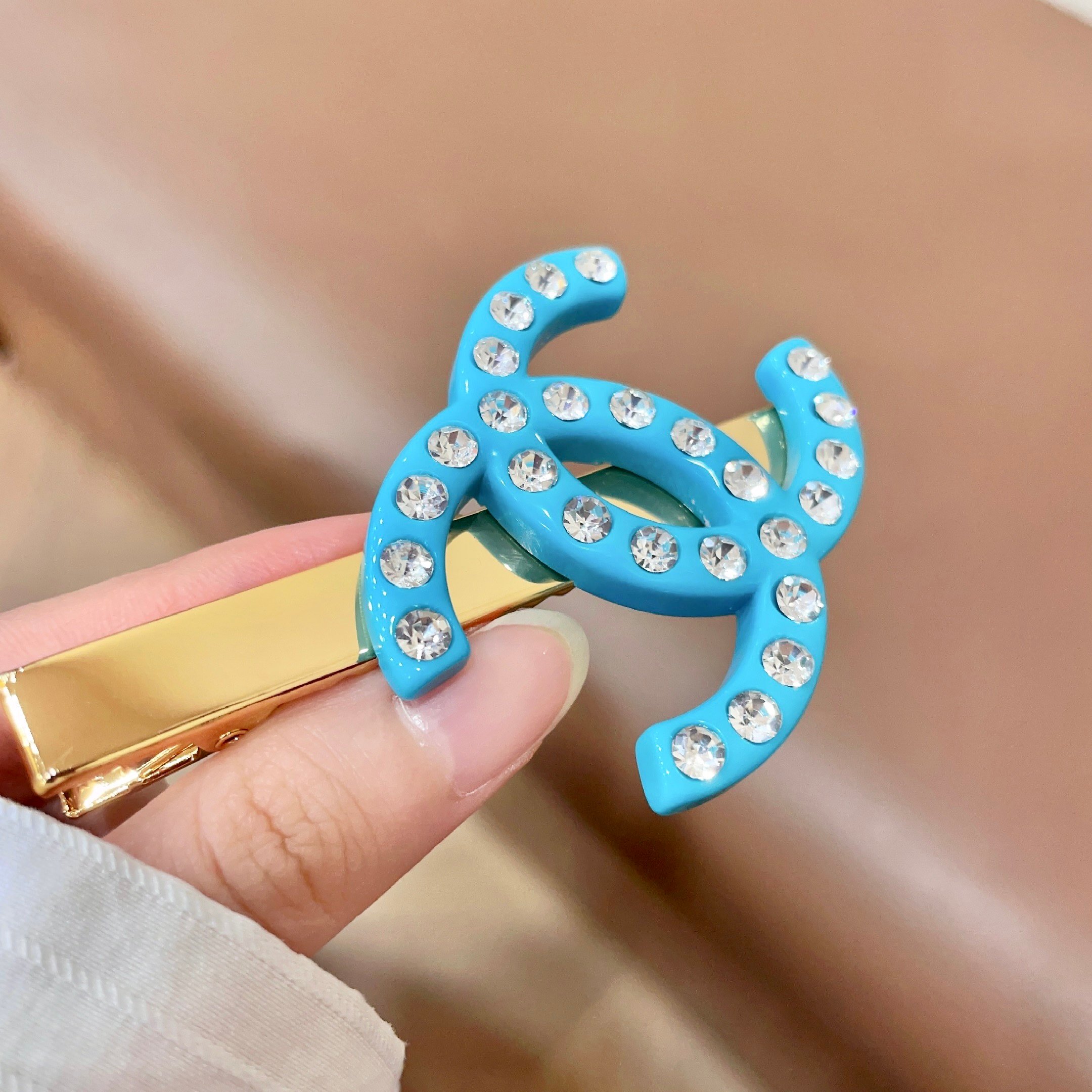 Chanel CC Logo Crystal Hair Clip brooch Turquoise blue resin gold-tone metal clear crystal 6cm