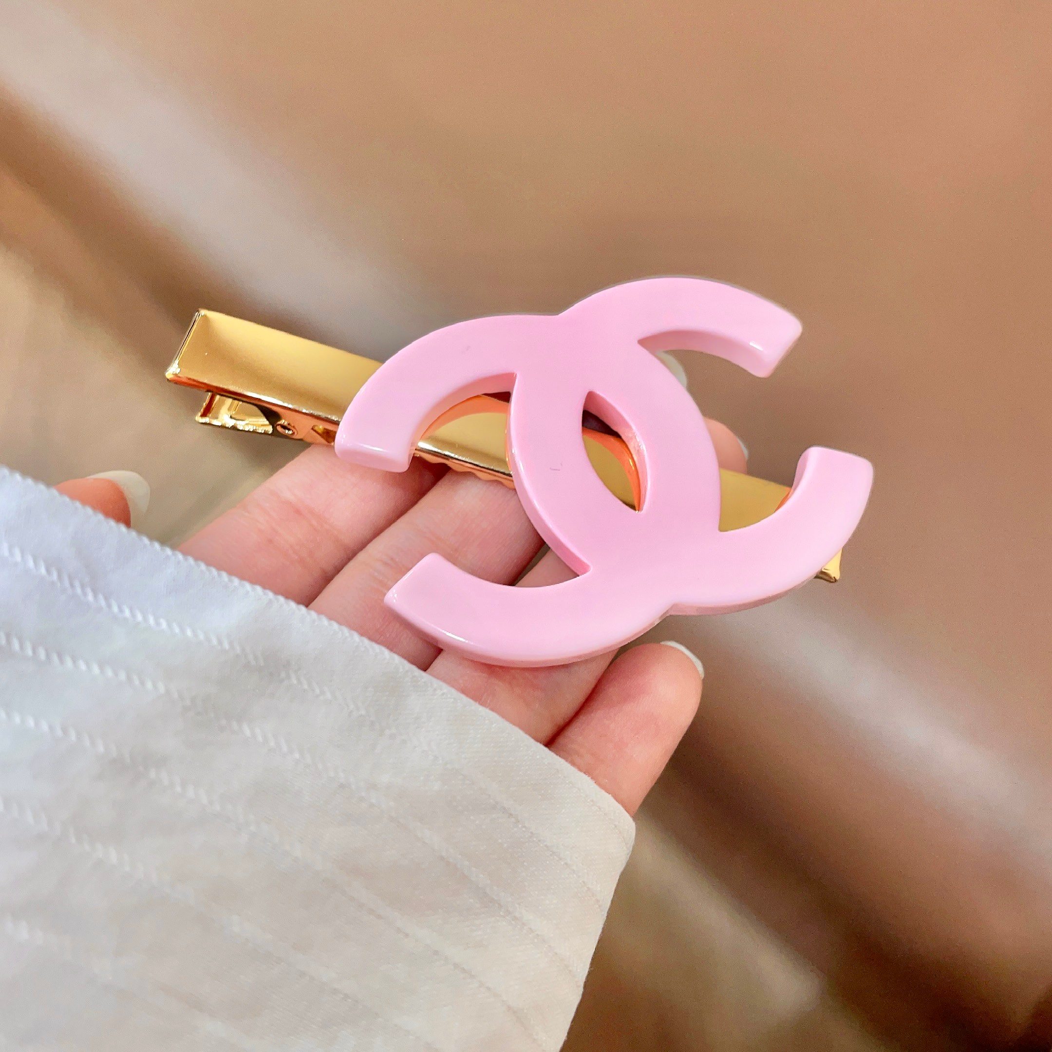 Chanel CC Logo Hair Clip brooch Gold-tone metal with light pink resin CC logo 6cm