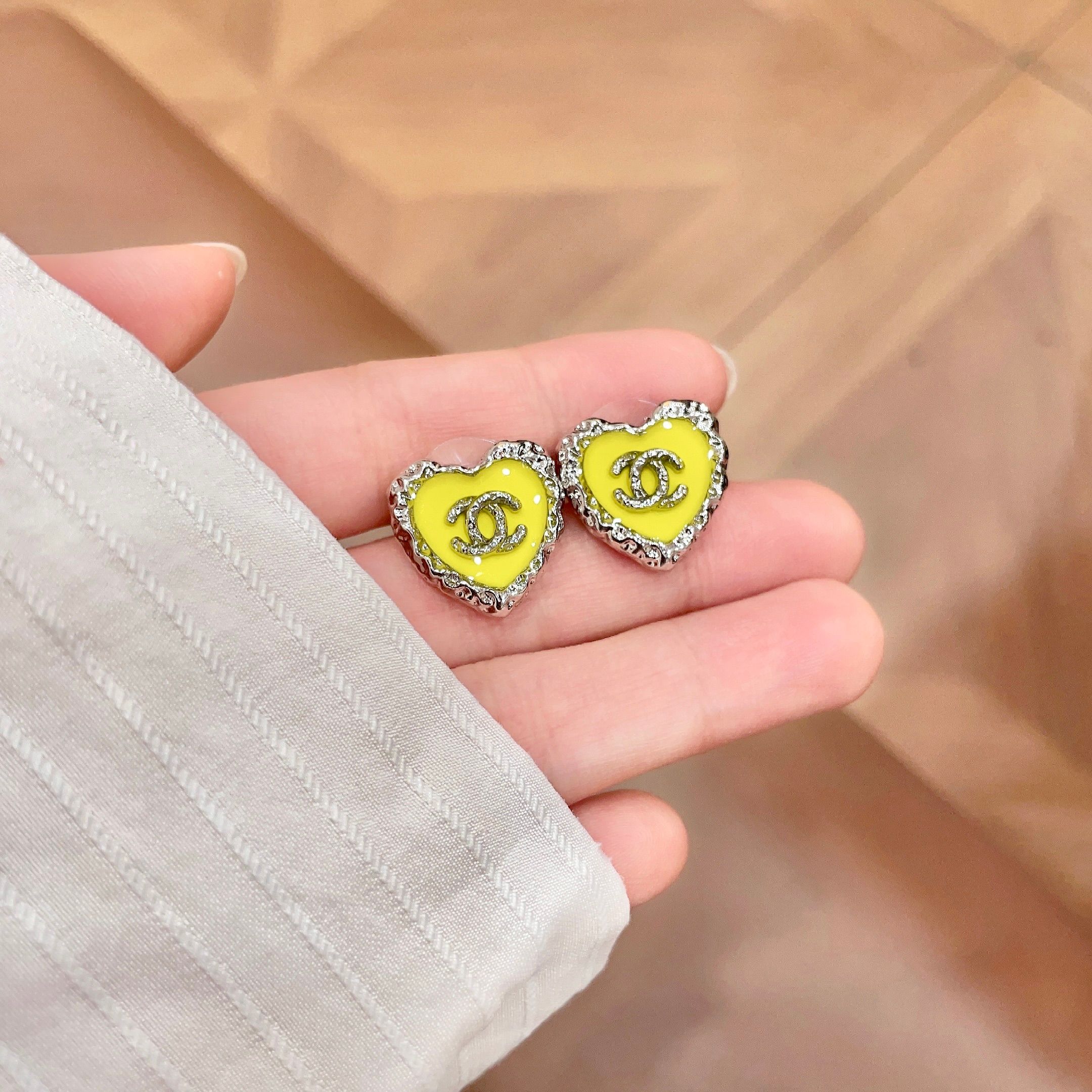 Chanel CC Heart Stud Earrings earrings silver-tone metal with bright yellow enamel 1 5cm diameter