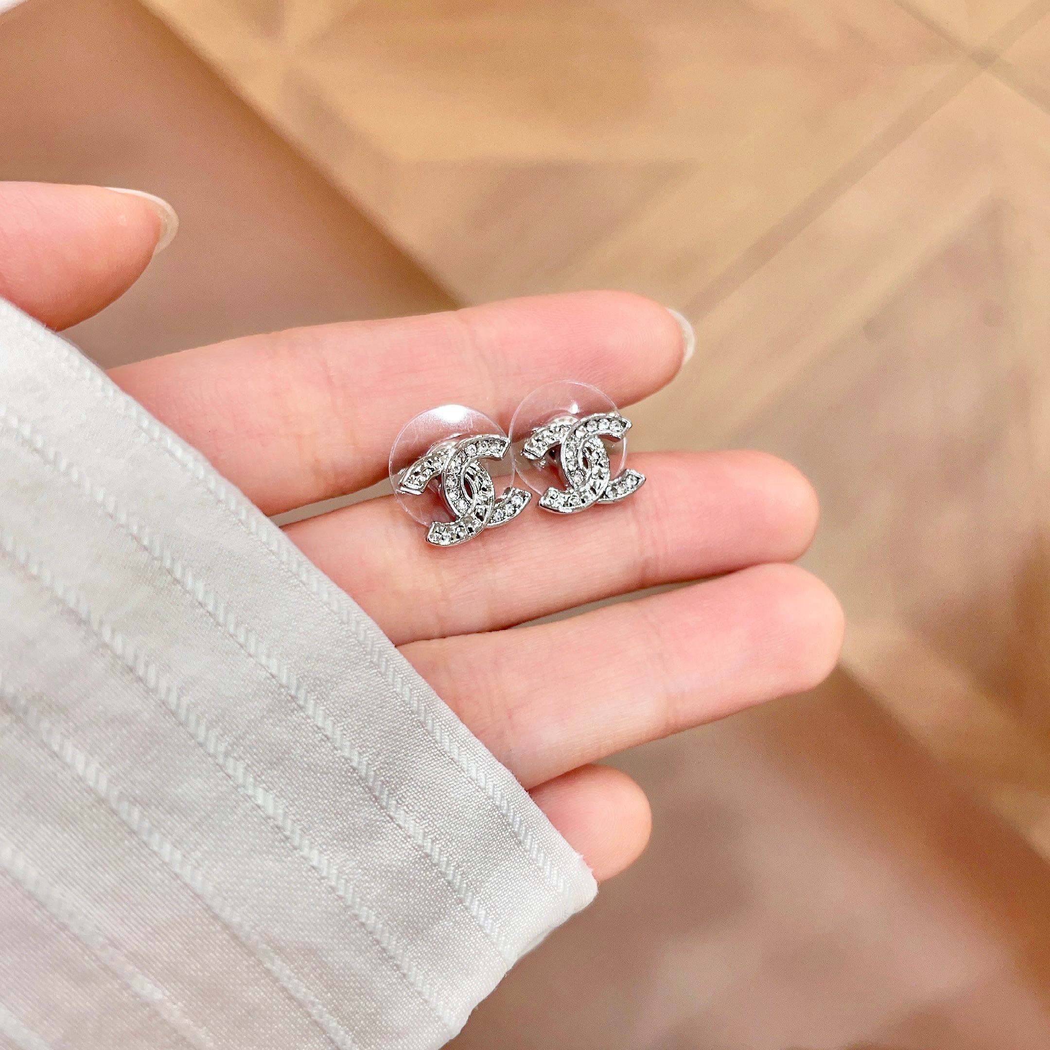 Chanel CC Logo Stud Earrings earrings Silver-toned metal with clear crystal accents One Size 1cm width