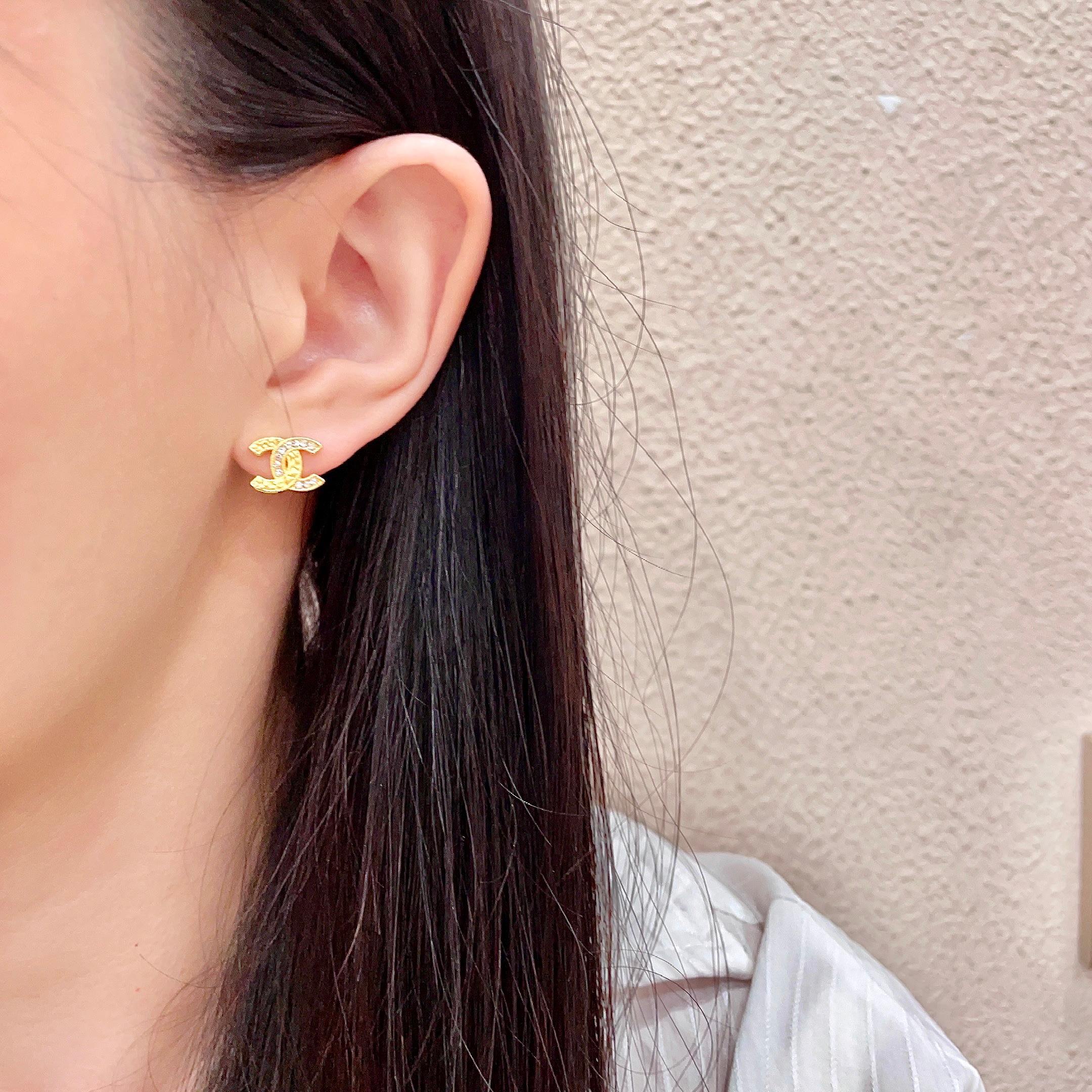 Chanel CC Logo Stud Earrings earrings Gold-tone metal with clear crystal accents silver-tone metal with clear crystal accents 1cm stud diameter
