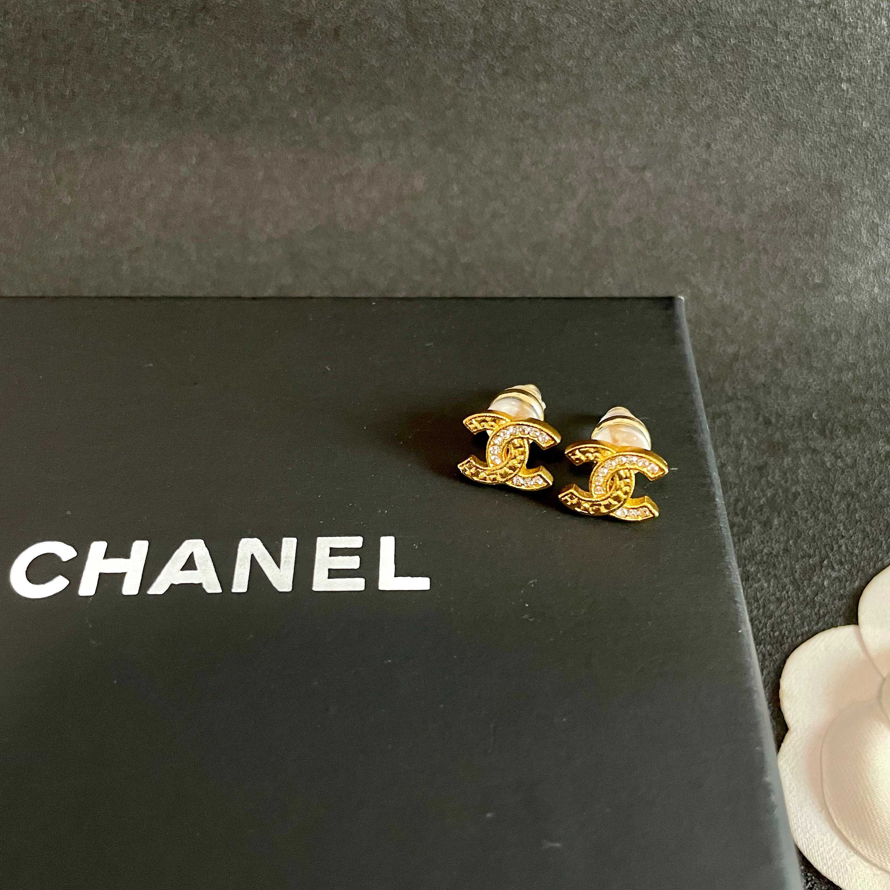 Chanel CC Logo Stud Earrings earrings Gold-tone metal with clear crystal accents silver-tone metal with clear crystal accents 1cm stud diameter