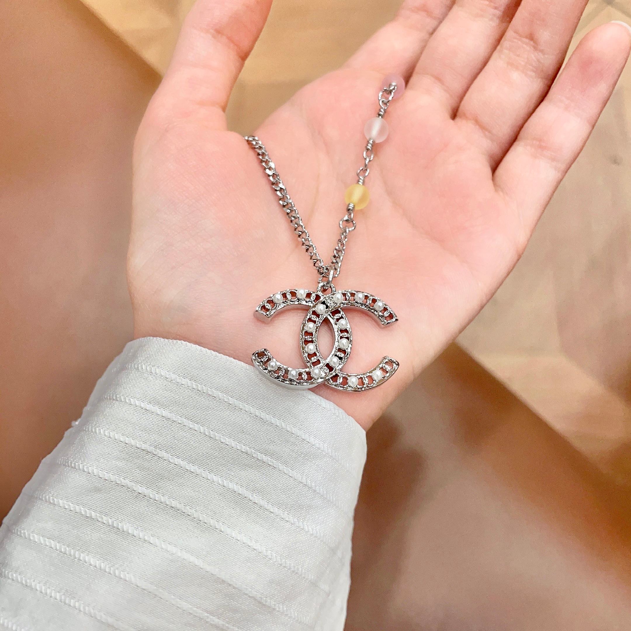 Chanel CC Logo Multicolor Bead Pearl Pendant Necklace necklace Silver-tone metal with white faux pearl accents pink clear yellow pastel resin beads 42cm