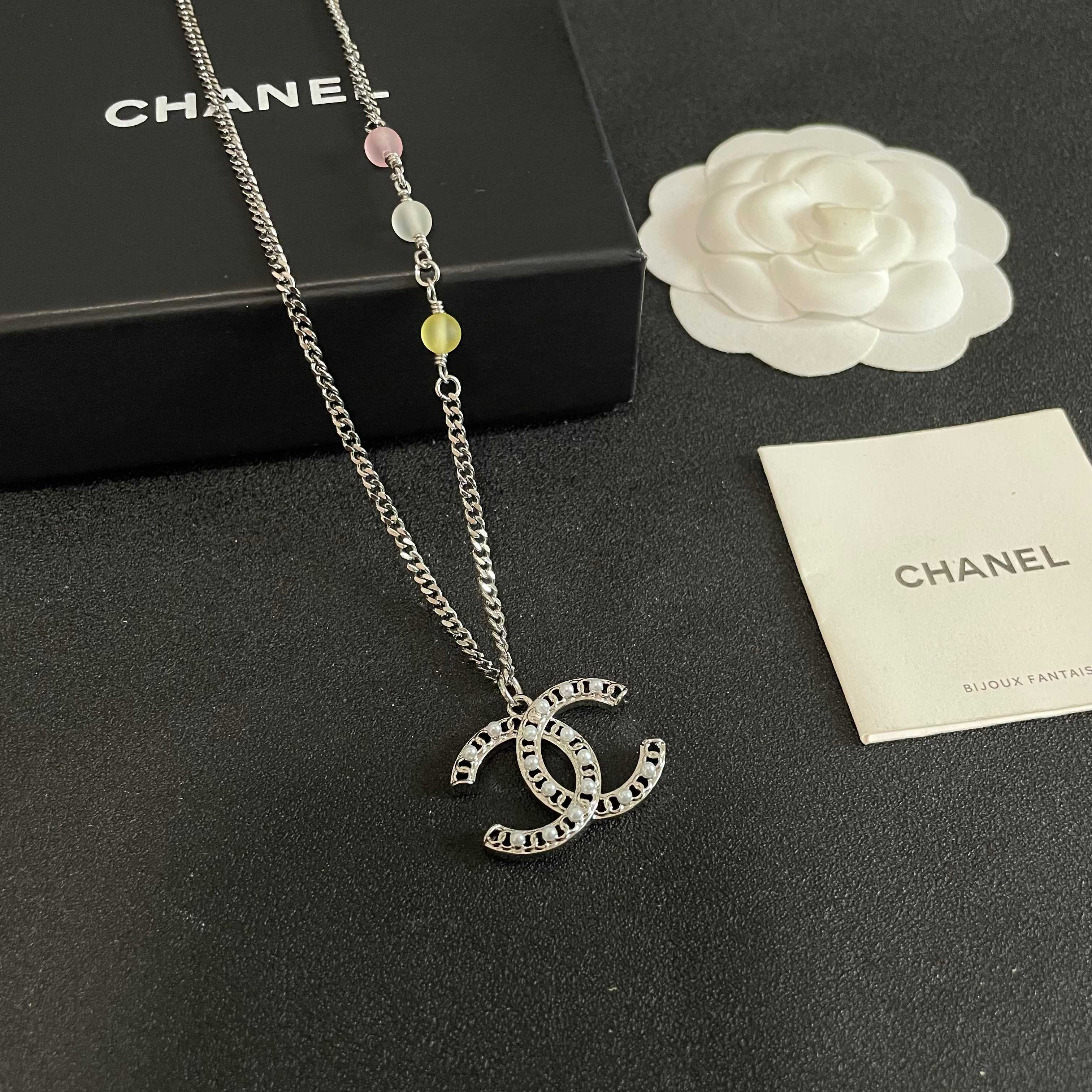 Chanel CC Logo Multicolor Bead Pearl Pendant Necklace necklace Silver-tone metal with white faux pearl accents pink clear yellow pastel resin beads 42cm