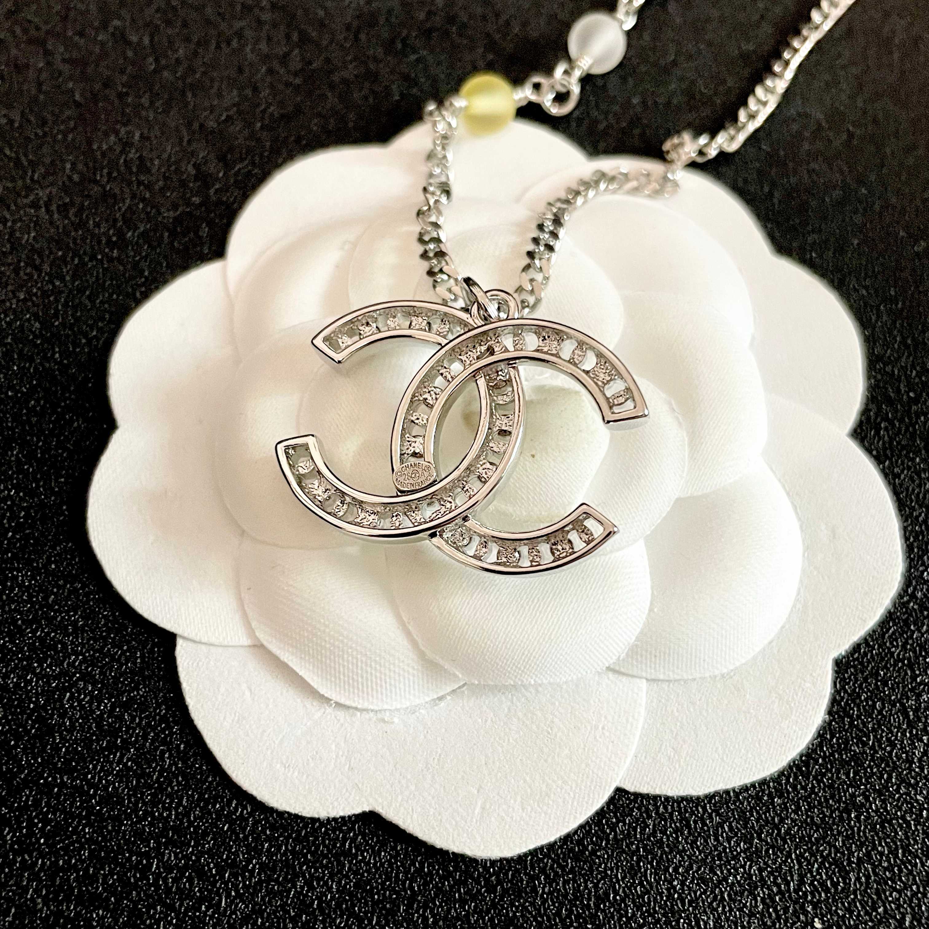 Chanel CC Logo Multicolor Bead Pearl Pendant Necklace necklace Silver-tone metal with white faux pearl accents pink clear yellow pastel resin beads 42cm