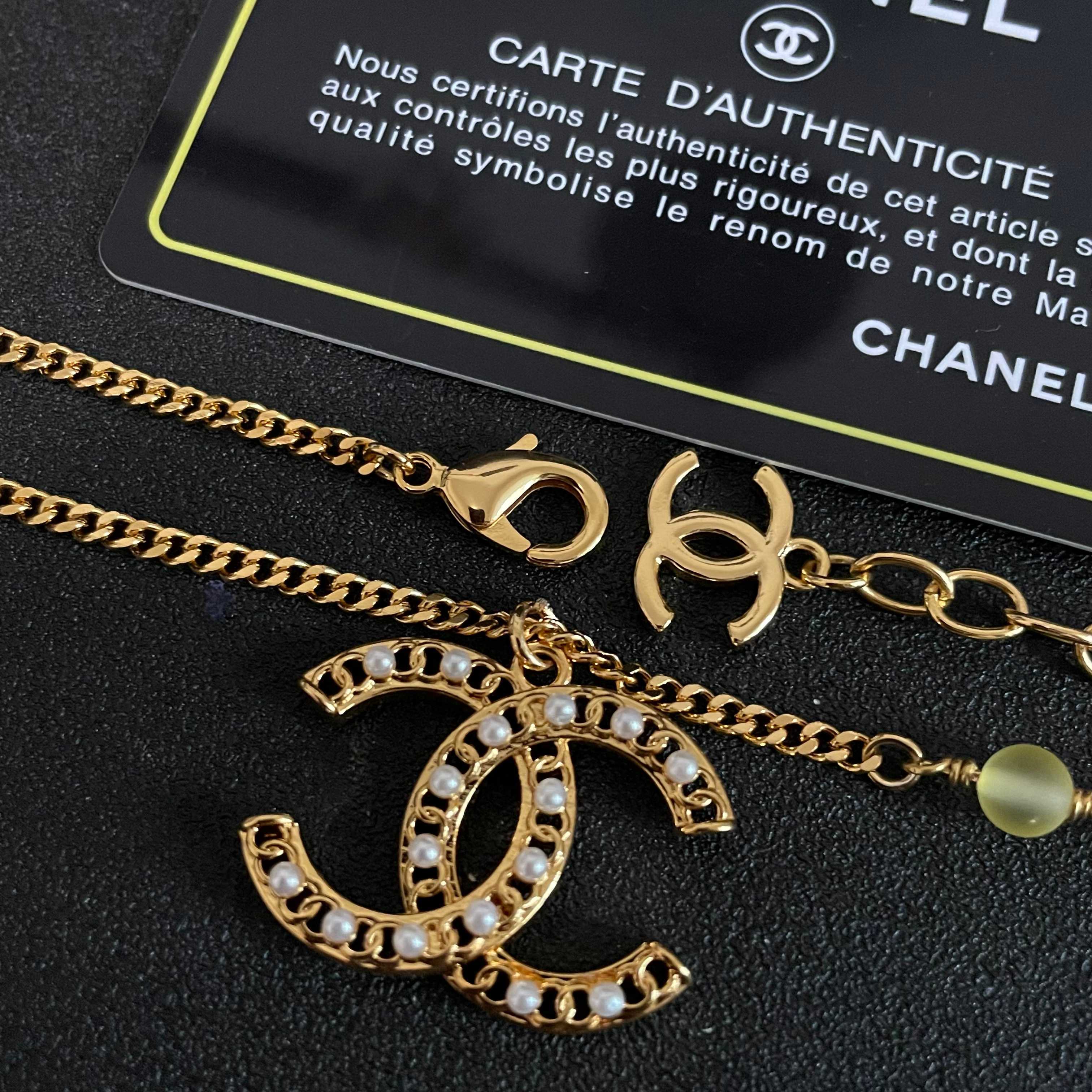 Chanel CC Logo Pastel Bead Pearl Necklace necklace Gold-tone metal with white faux pearls pastel pink frosted clear and pale yellow accent beads 42cm