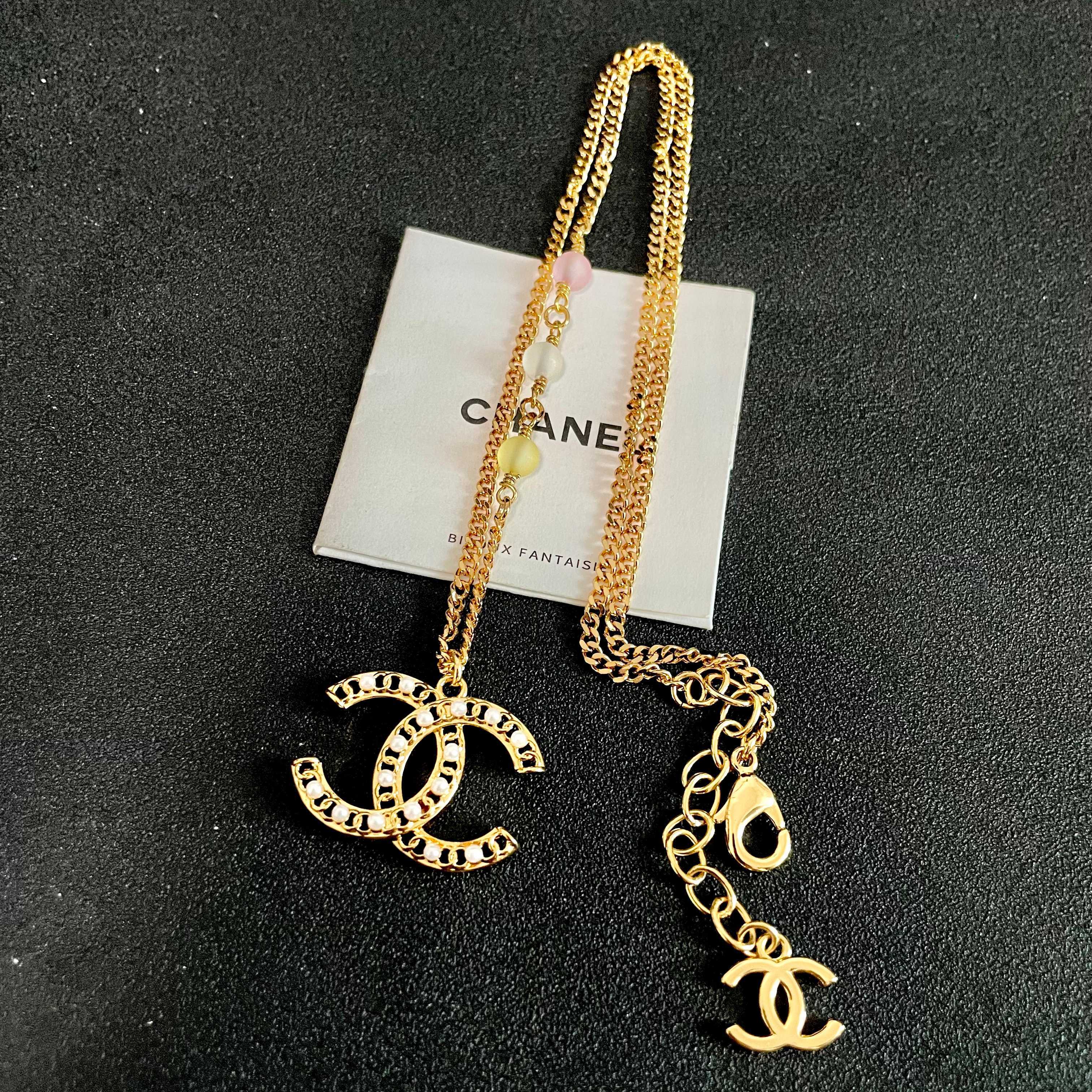 Chanel CC Logo Pastel Bead Pearl Necklace necklace Gold-tone metal with white faux pearls pastel pink frosted clear and pale yellow accent beads 42cm