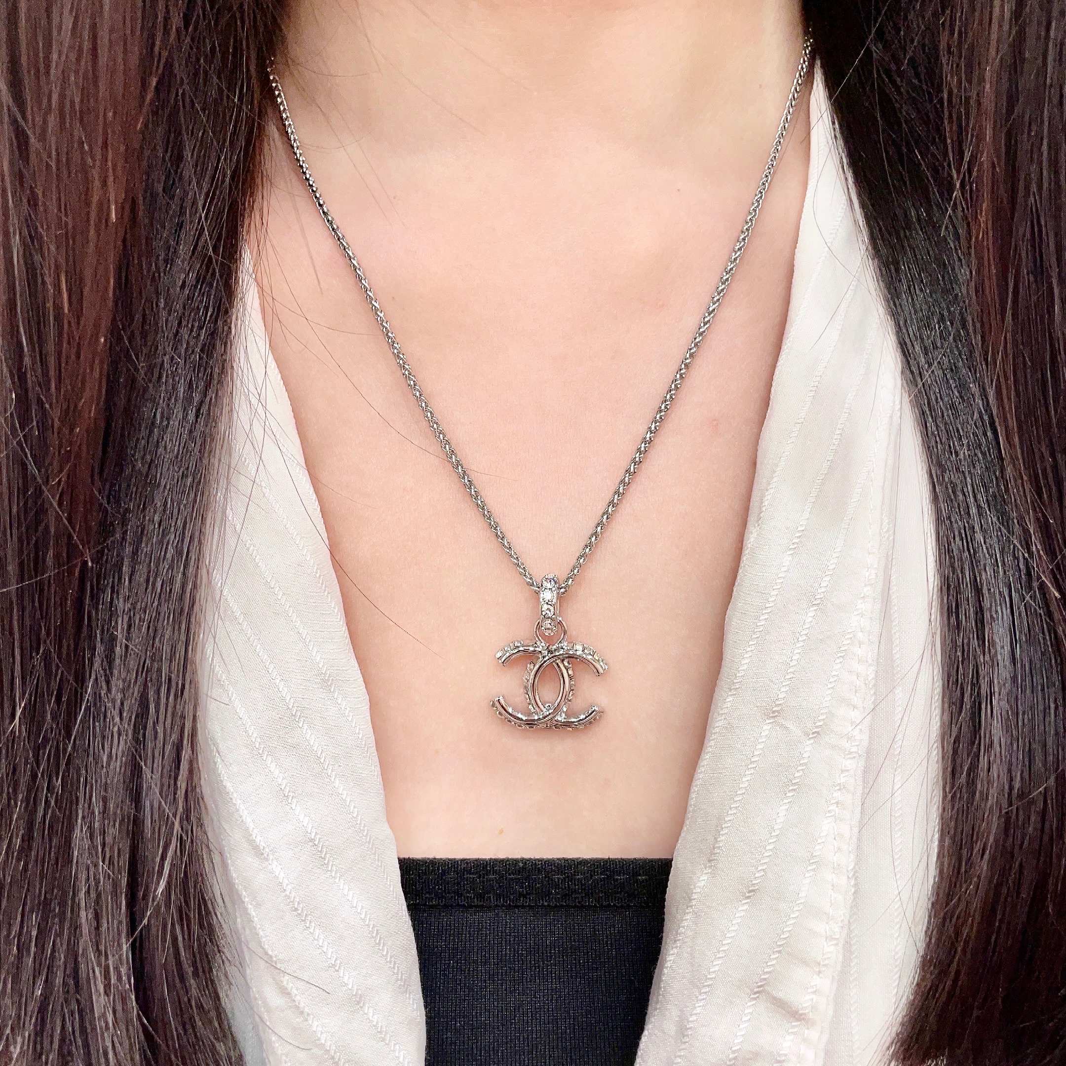 Chanel CC Logo Pendant Necklace necklace Silver-toned metal with clear crystal accents 42cm