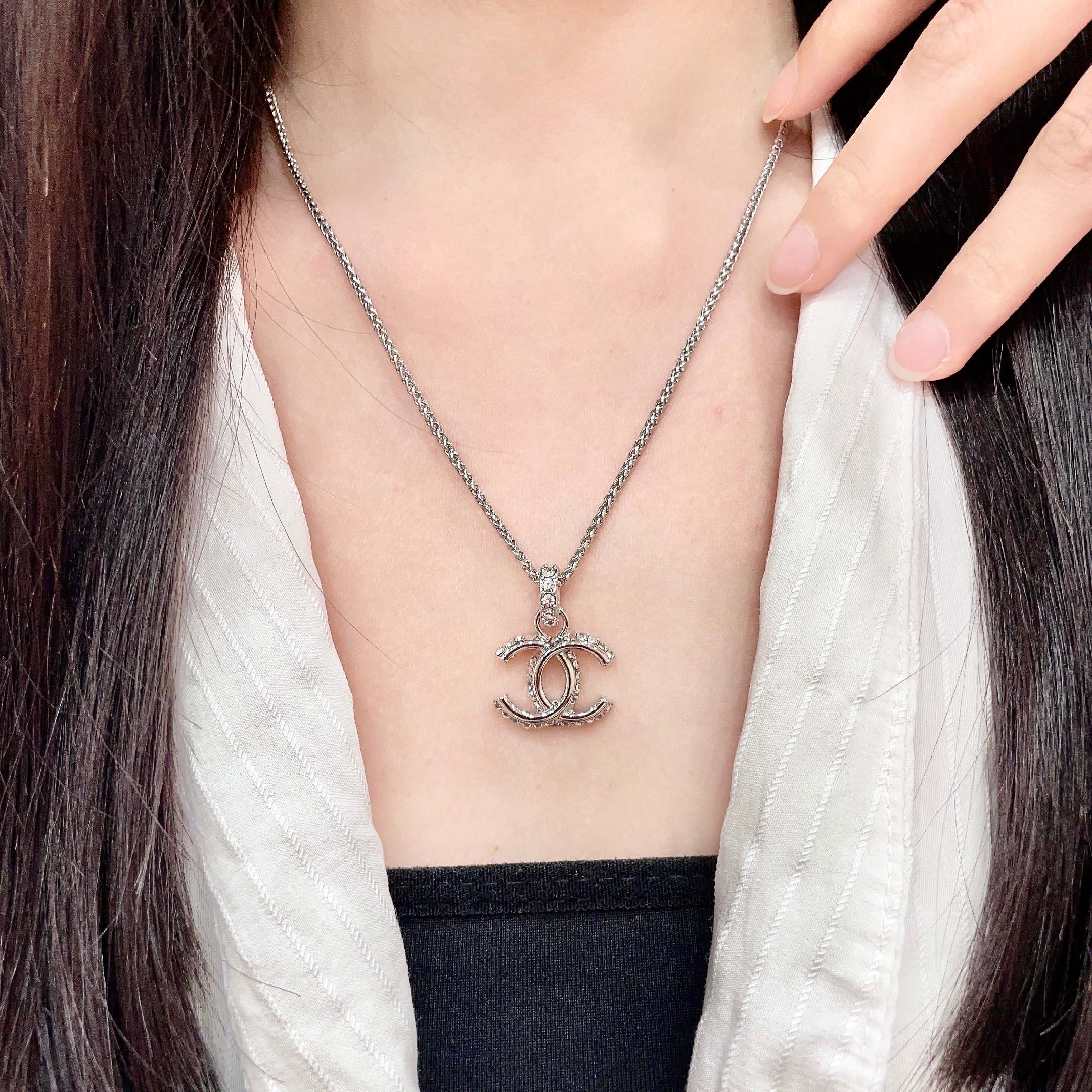 Chanel CC Logo Pendant Necklace necklace Silver-toned metal with clear crystal accents 42cm