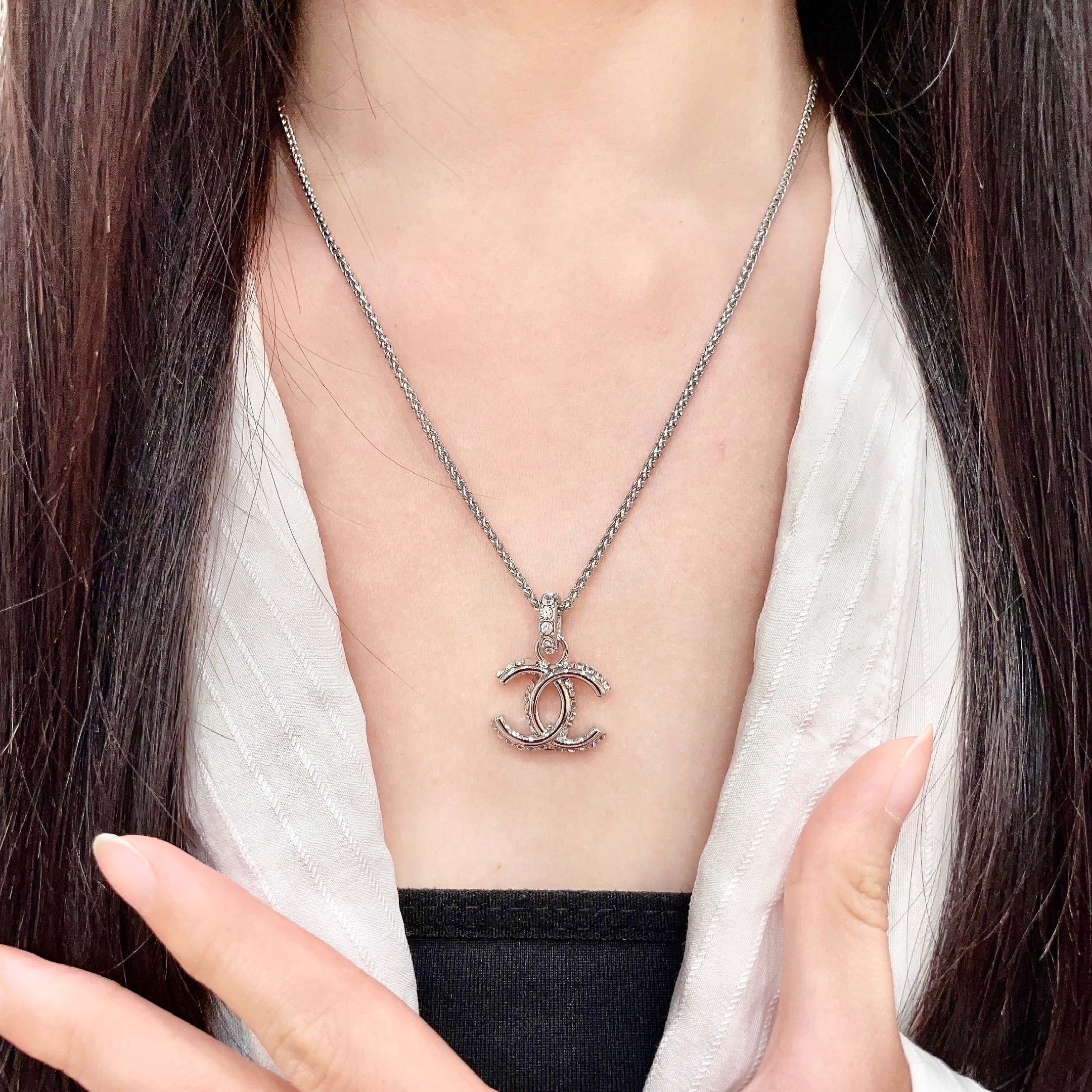 Chanel CC Logo Pendant Necklace necklace Silver-toned metal with clear crystal accents 42cm