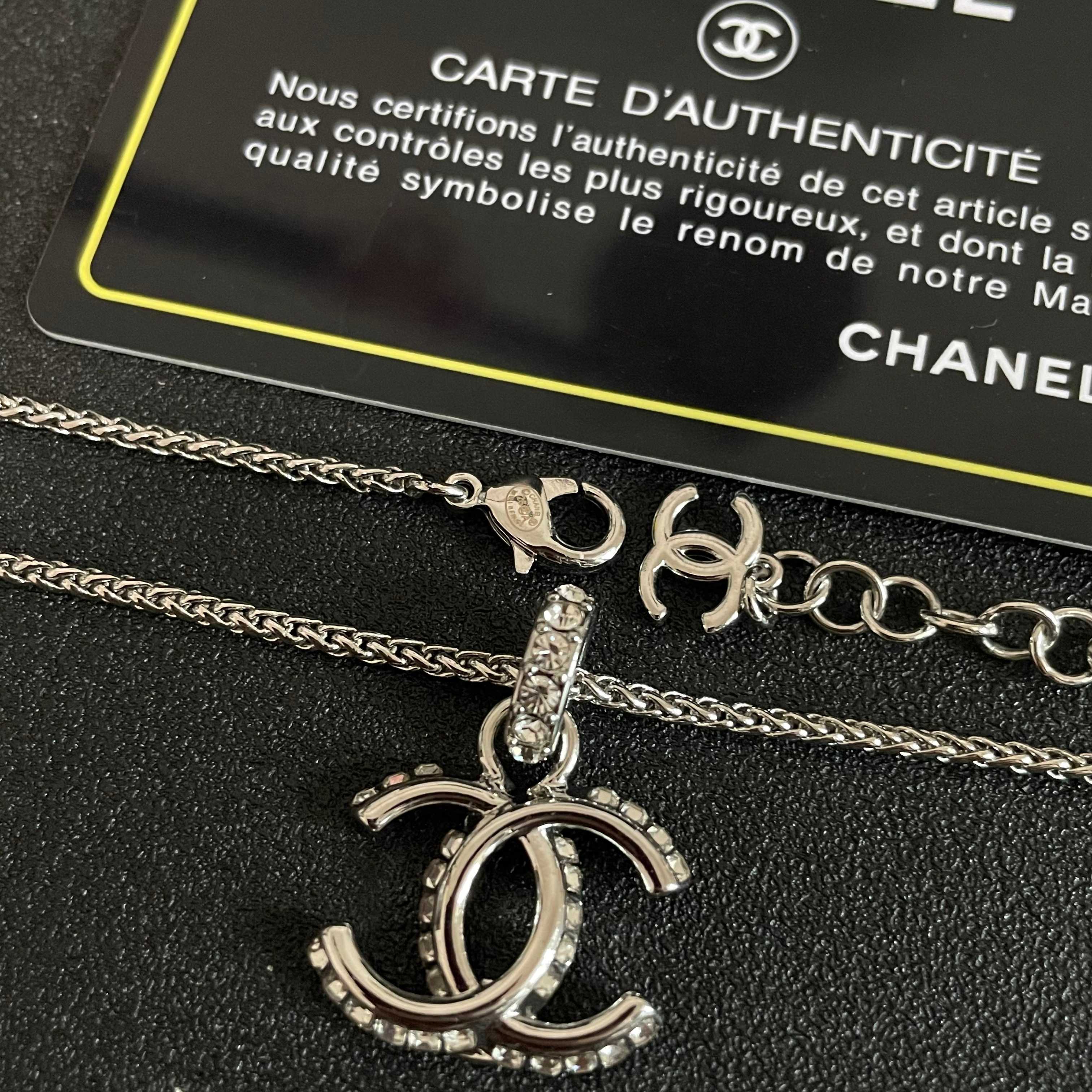 Chanel CC Logo Pendant Necklace necklace Silver-toned metal with clear crystal accents 42cm