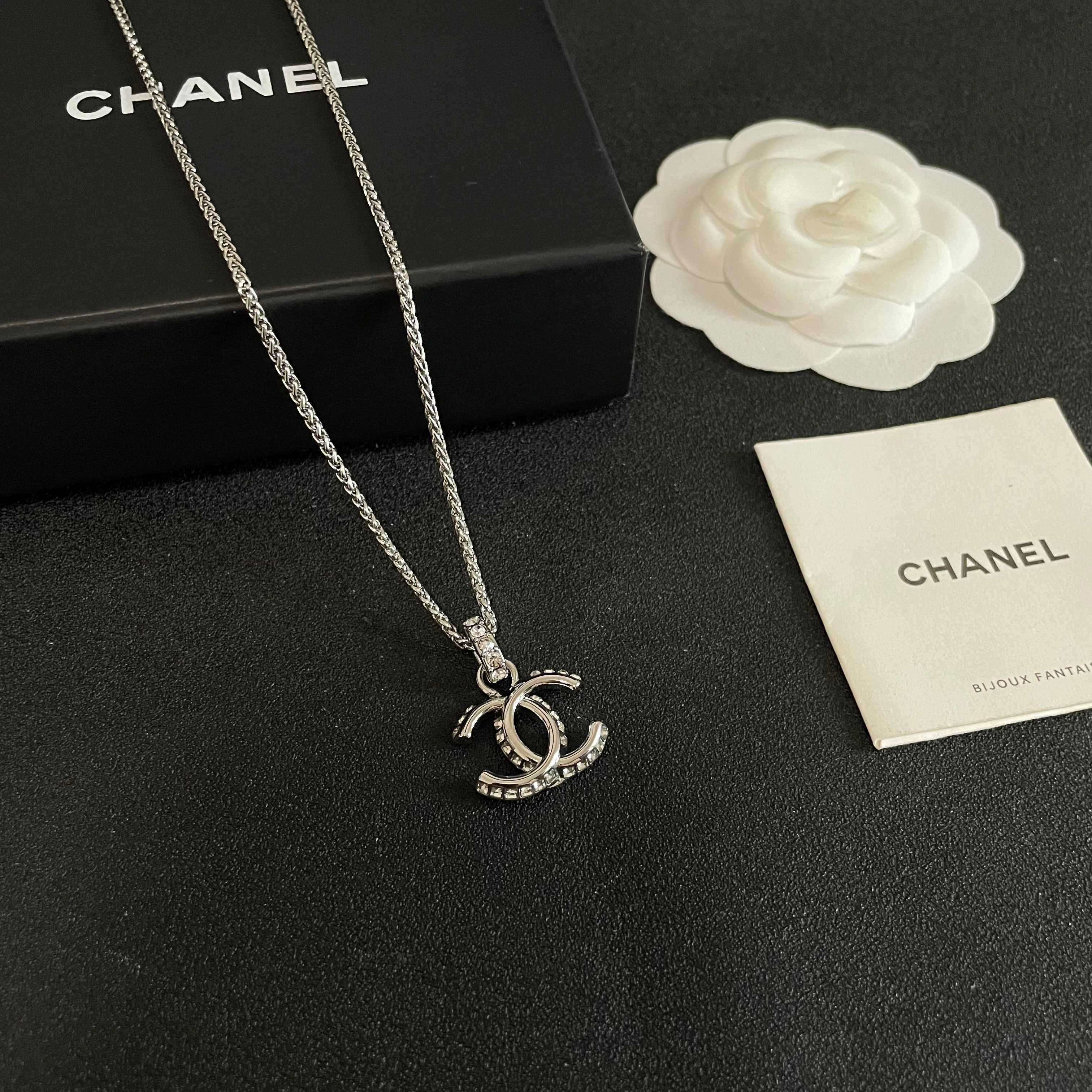 Chanel CC Logo Pendant Necklace necklace Silver-toned metal with clear crystal accents 42cm