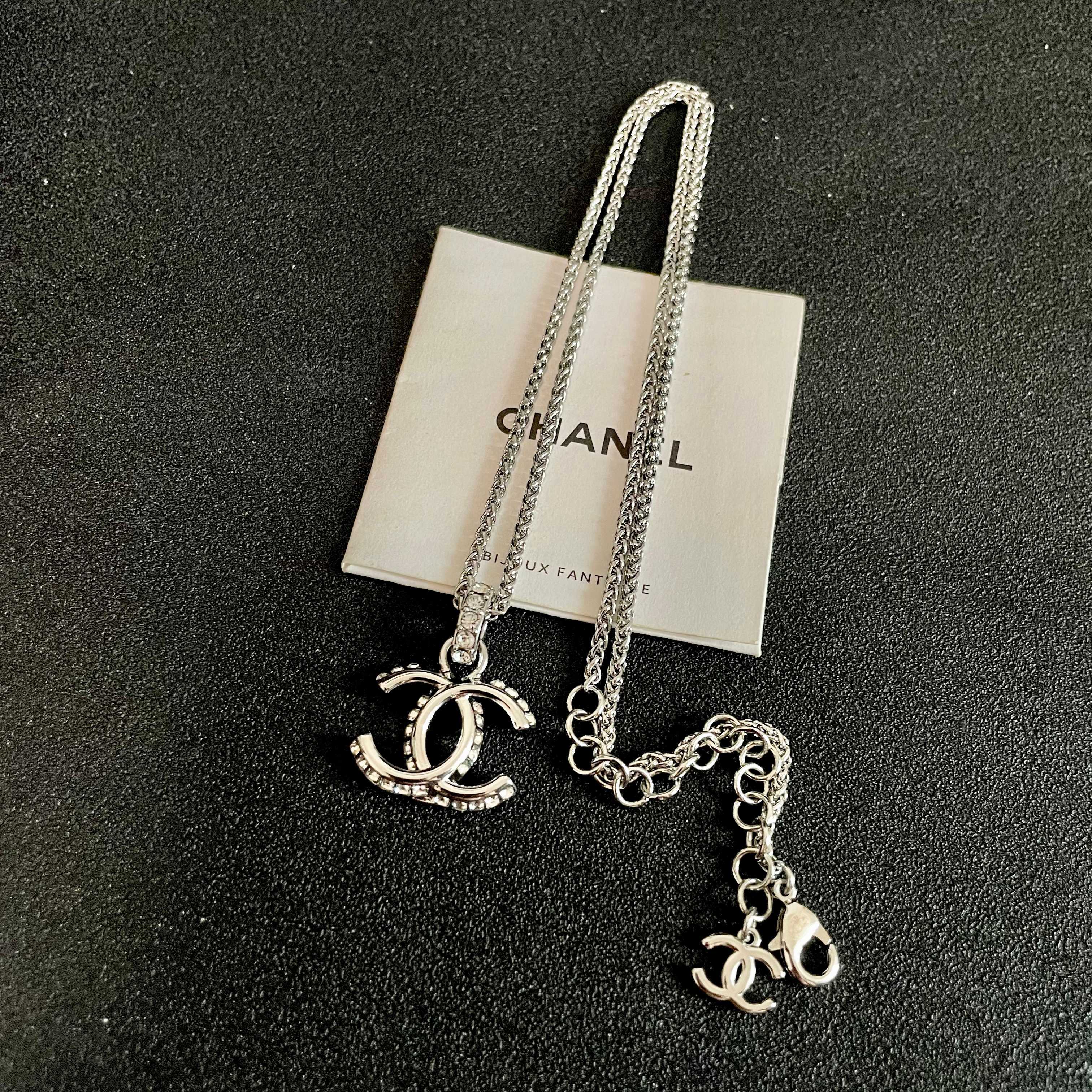 Chanel CC Logo Pendant Necklace necklace Silver-toned metal with clear crystal accents 42cm