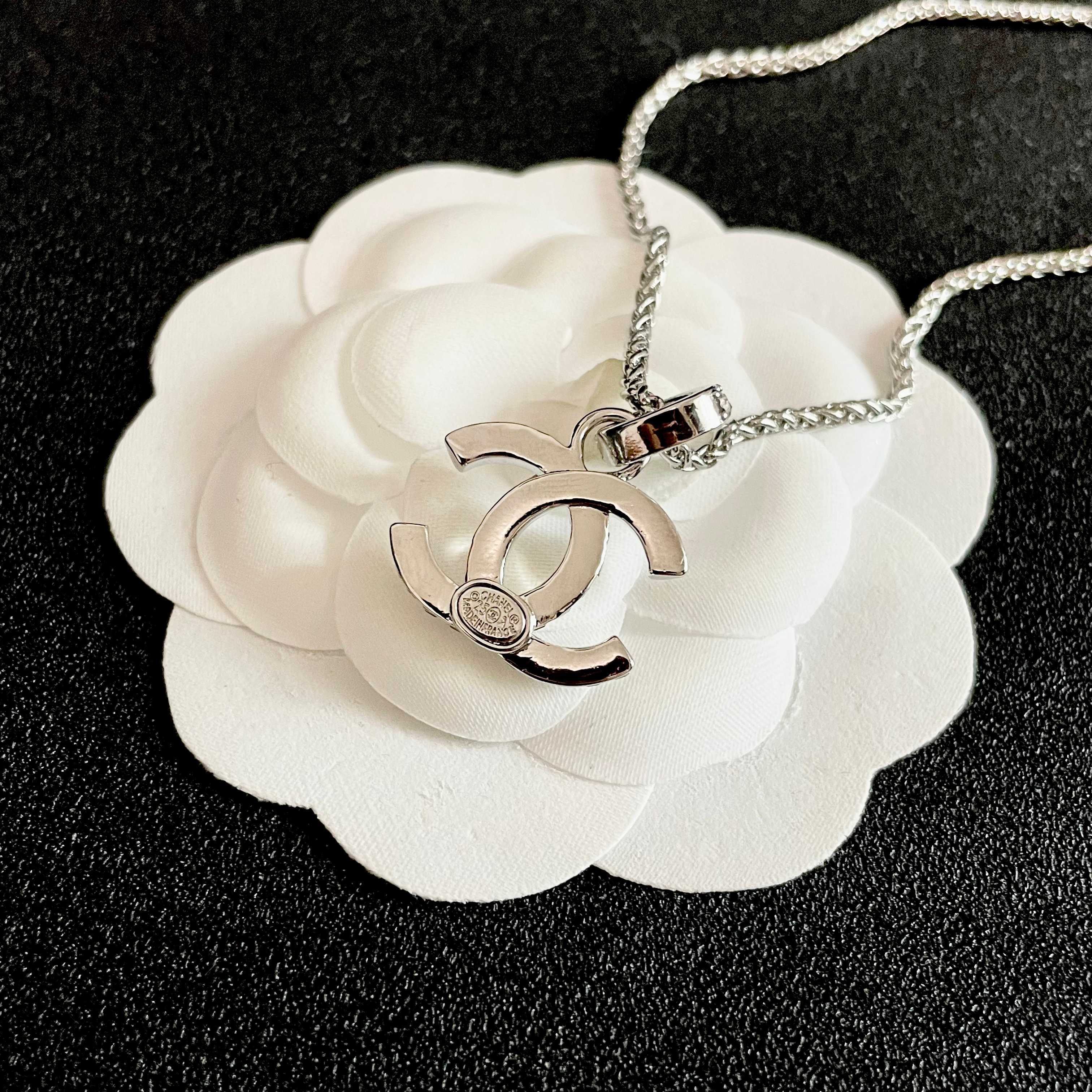 Chanel CC Logo Pendant Necklace necklace Silver-toned metal with clear crystal accents 42cm