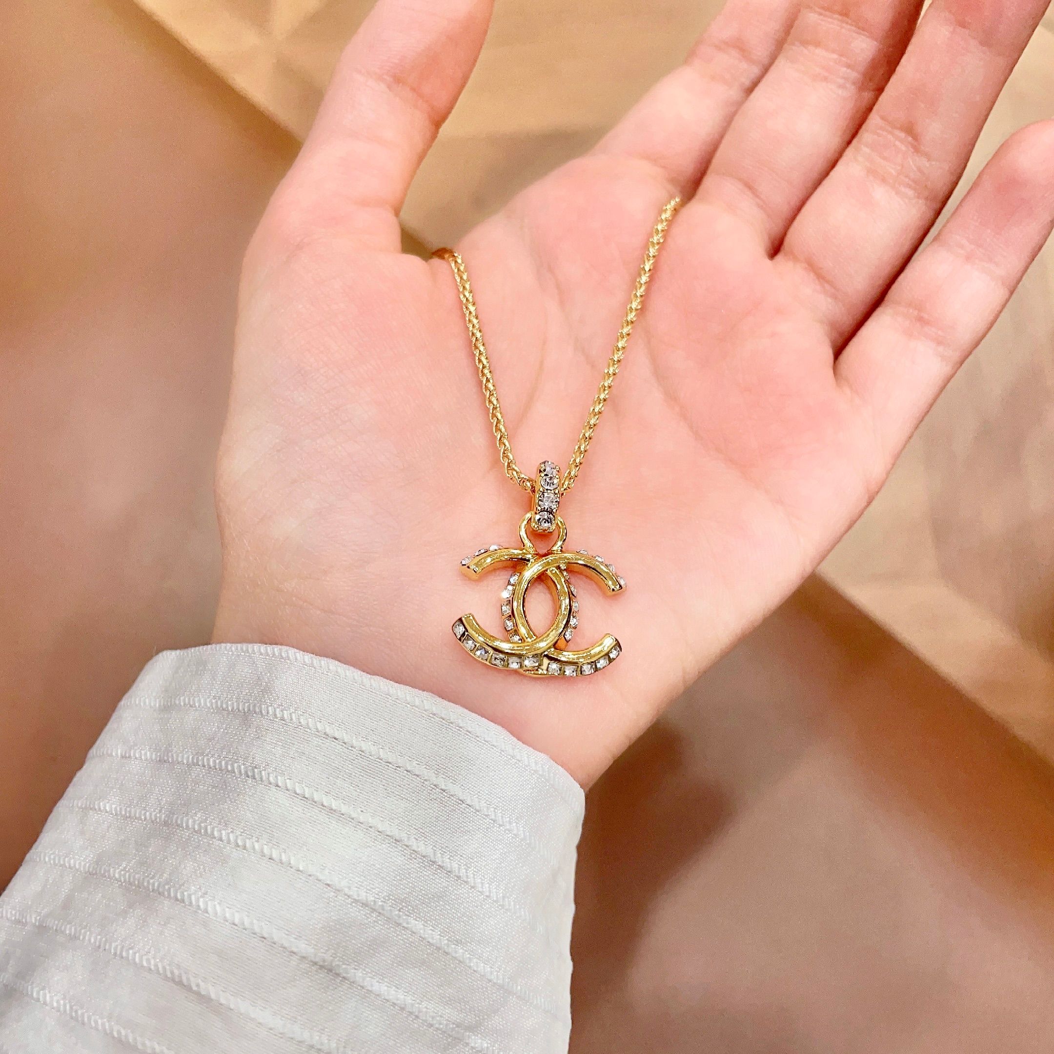 Chanel CC Logo Crystal Pendant Necklace necklace Gold-tone metal with clear crystal accents 42cm