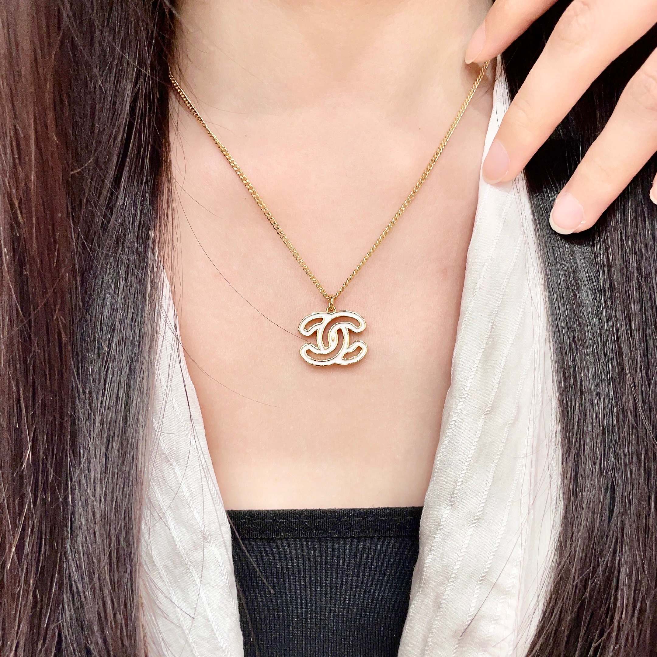Chanel CC Logo Pendant Necklace necklace Gold-tone metal with white enamel fill 42cm