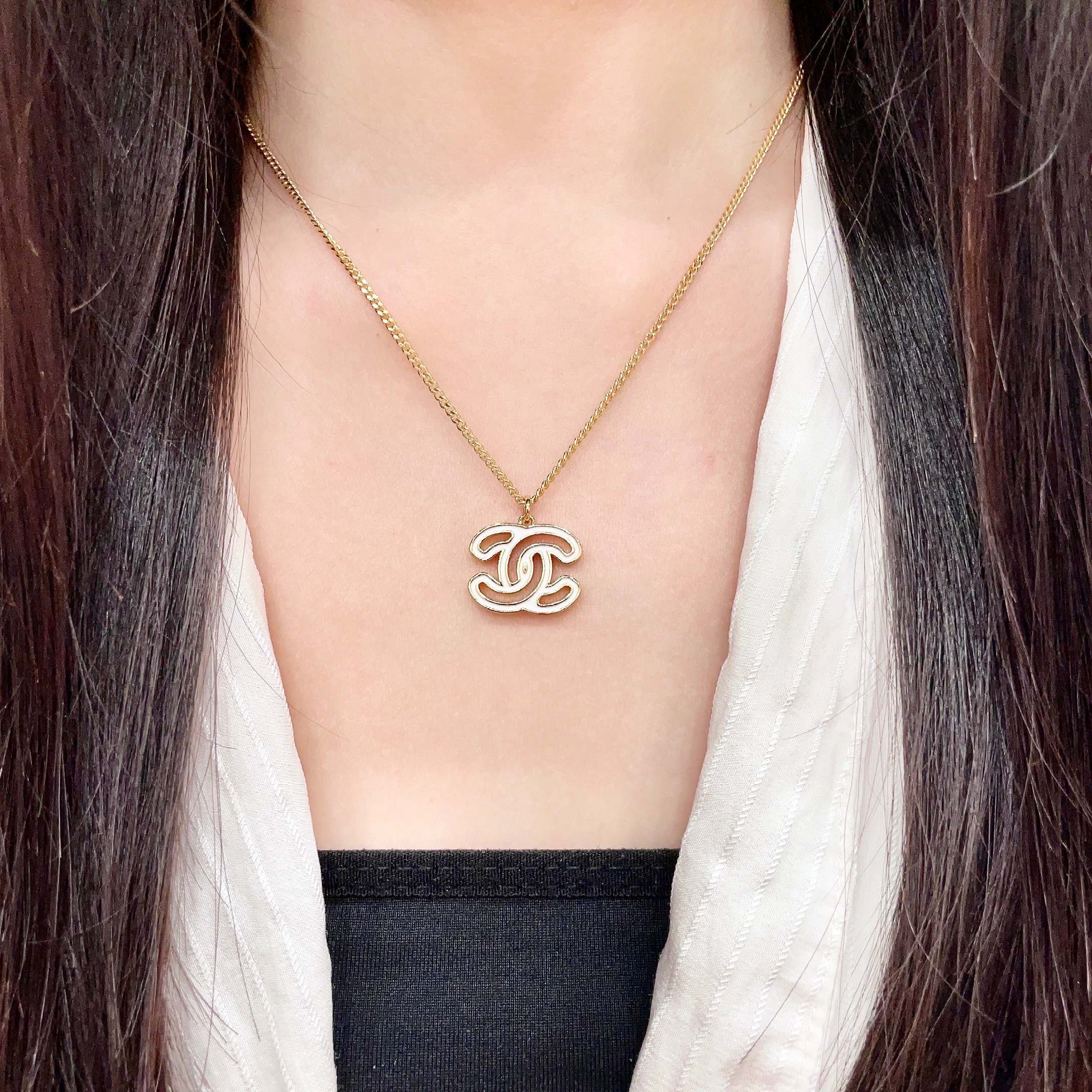 Chanel CC Logo Pendant Necklace necklace Gold-tone metal with white enamel fill 42cm