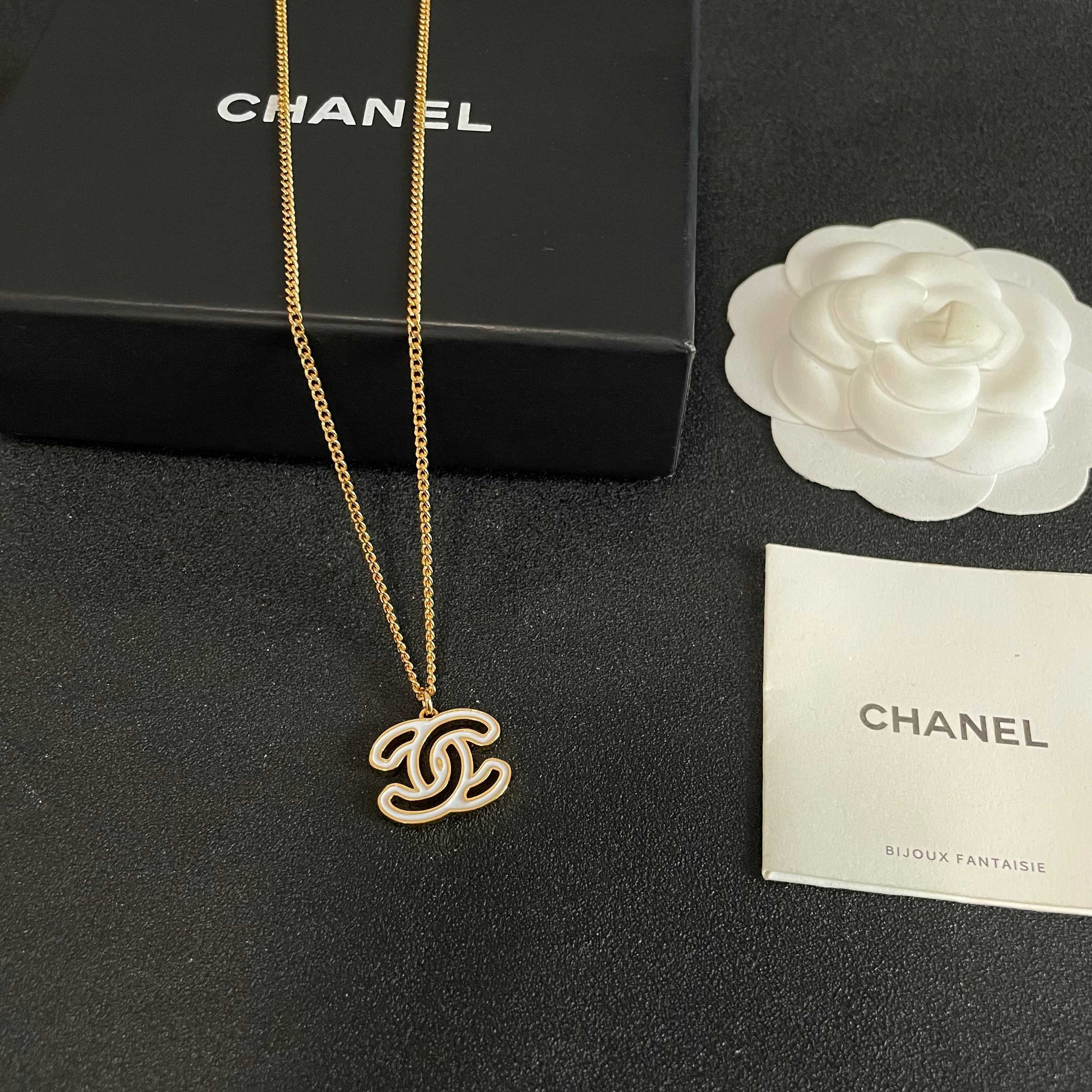 Chanel CC Logo Pendant Necklace necklace Gold-tone metal with white enamel fill 42cm