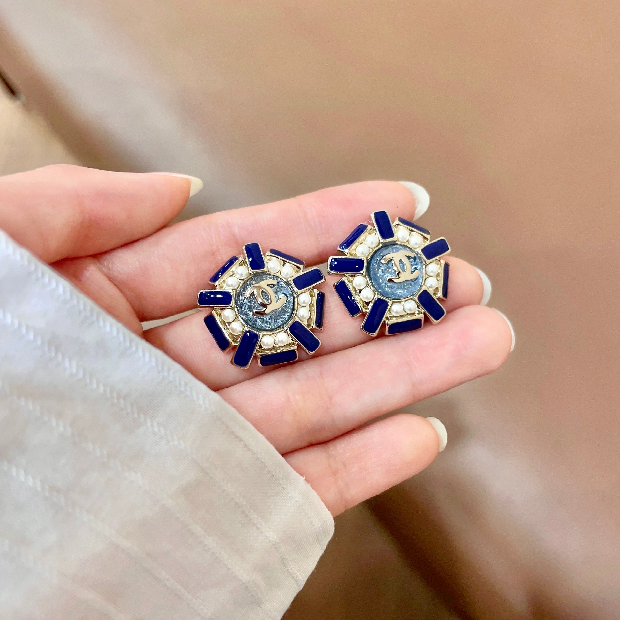 Chanel CC Logo Blue Enamel Pearl Stud Earrings earrings gold tone metal royal blue enamel white faux pearl gray textured center 2cm diameter