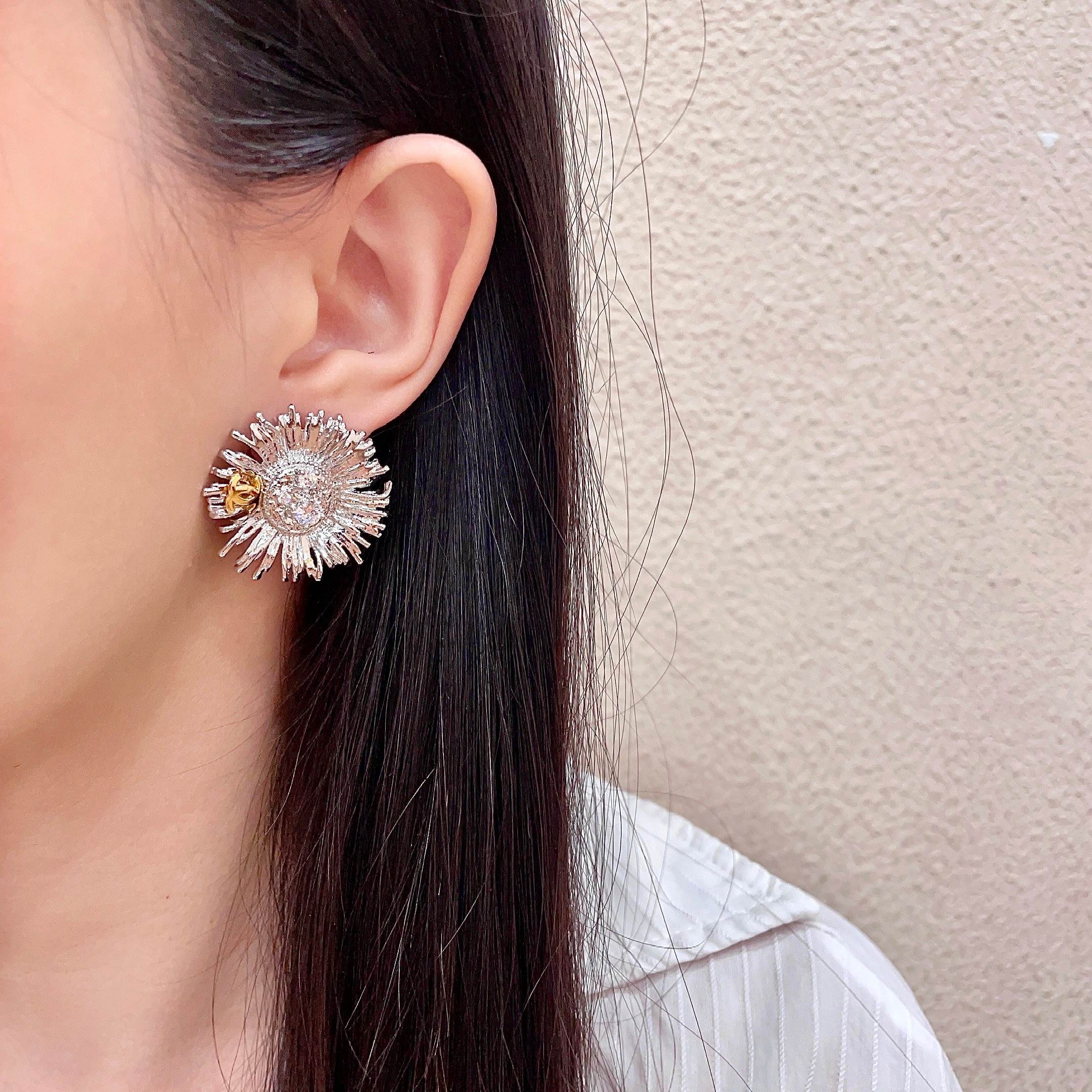 Chanel Sunburst CC Stud Earrings earrings Two-tone gold and silver metal with clear crystal accents 2 5cm diameter