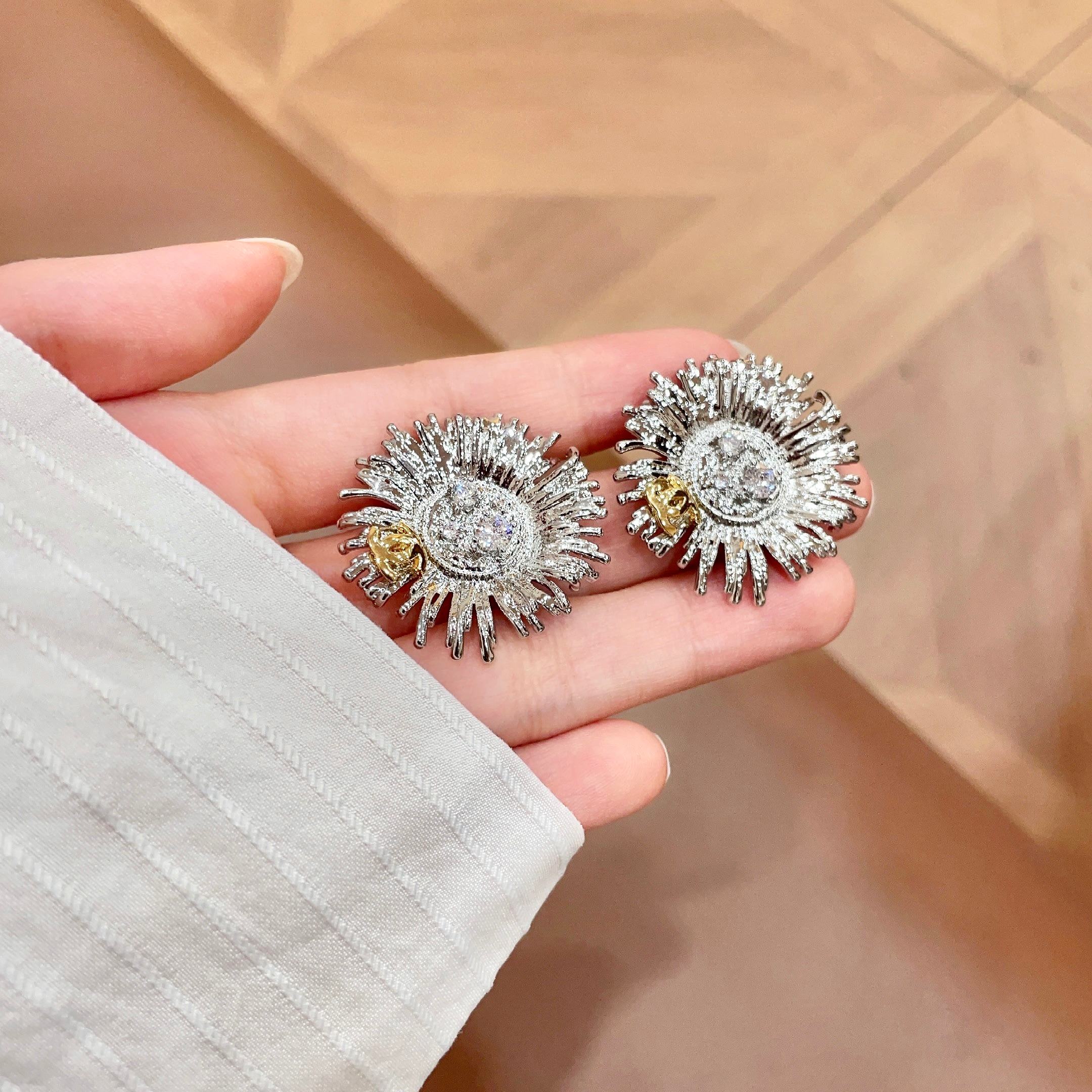 Chanel Sunburst CC Stud Earrings earrings Two-tone gold and silver metal with clear crystal accents 2 5cm diameter