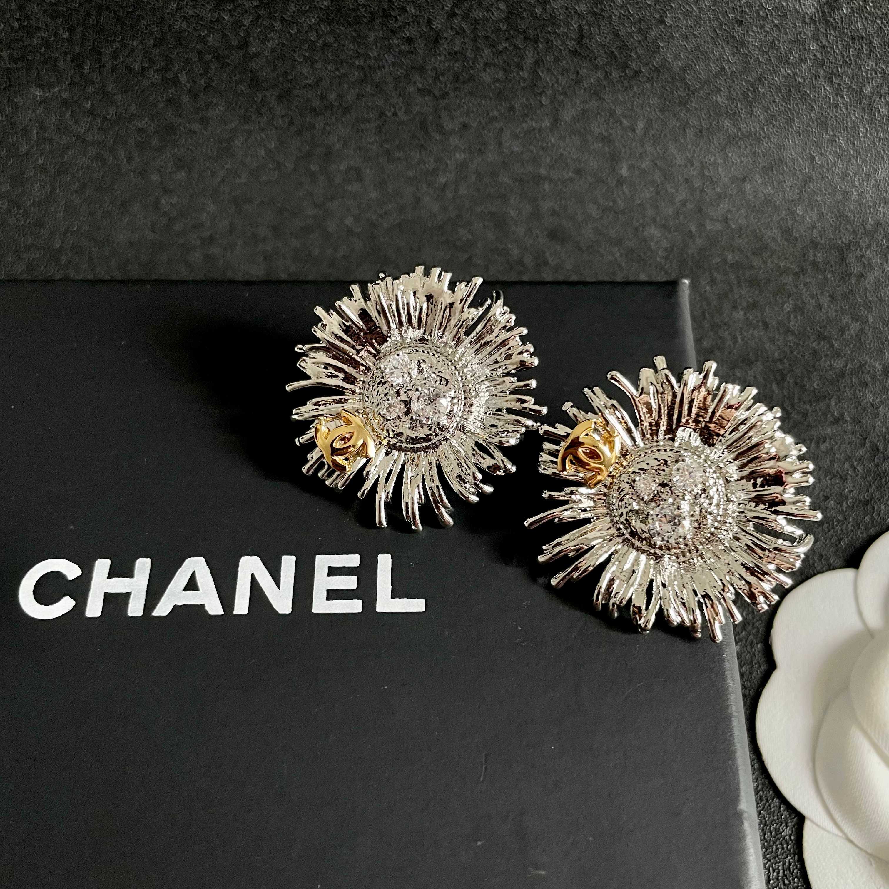 Chanel Sunburst CC Stud Earrings earrings Two-tone gold and silver metal with clear crystal accents 2 5cm diameter