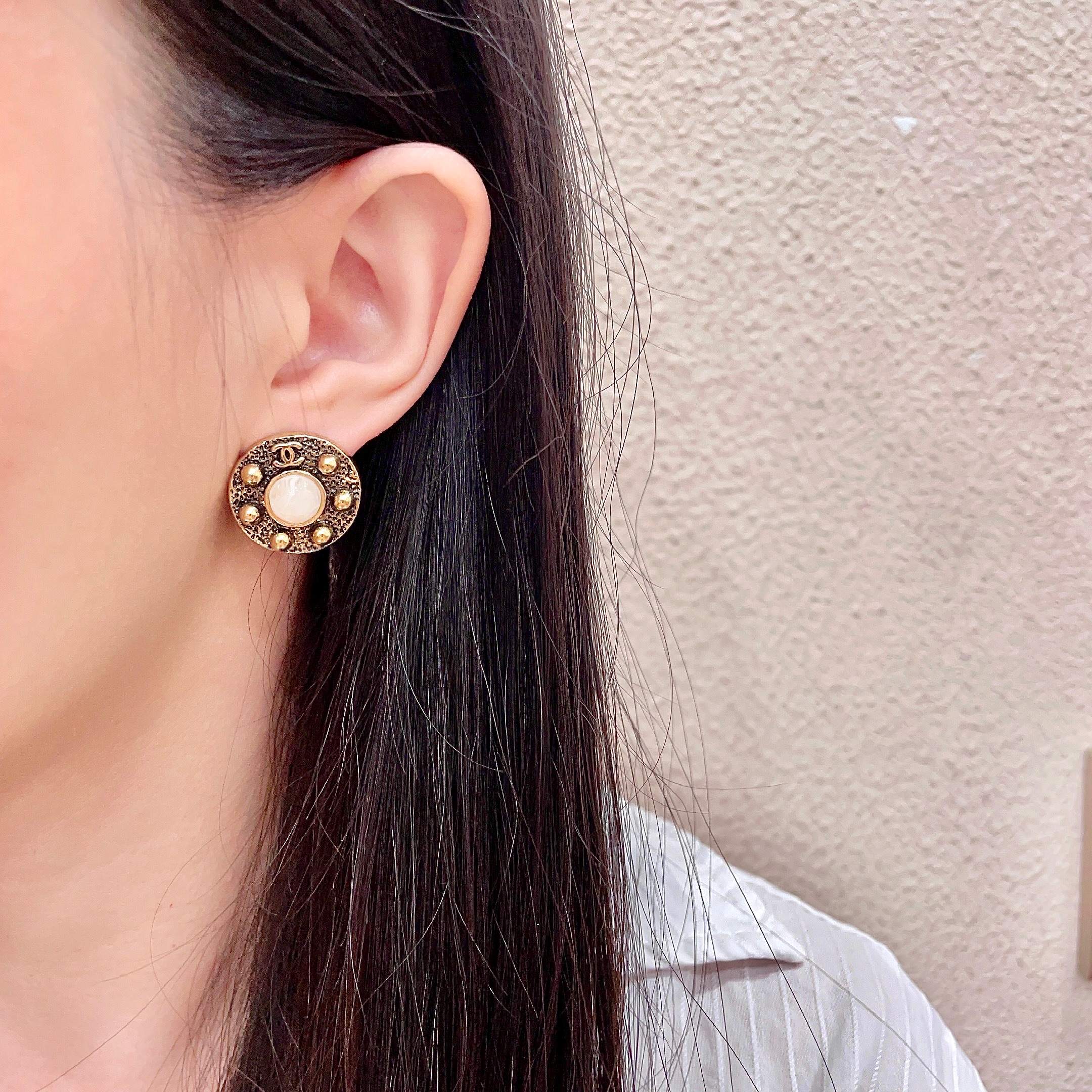 Chanel CC Logo Round Stud Earrings earrings antique gold metal white mother-of-pearl center stone 1 5cm diameter