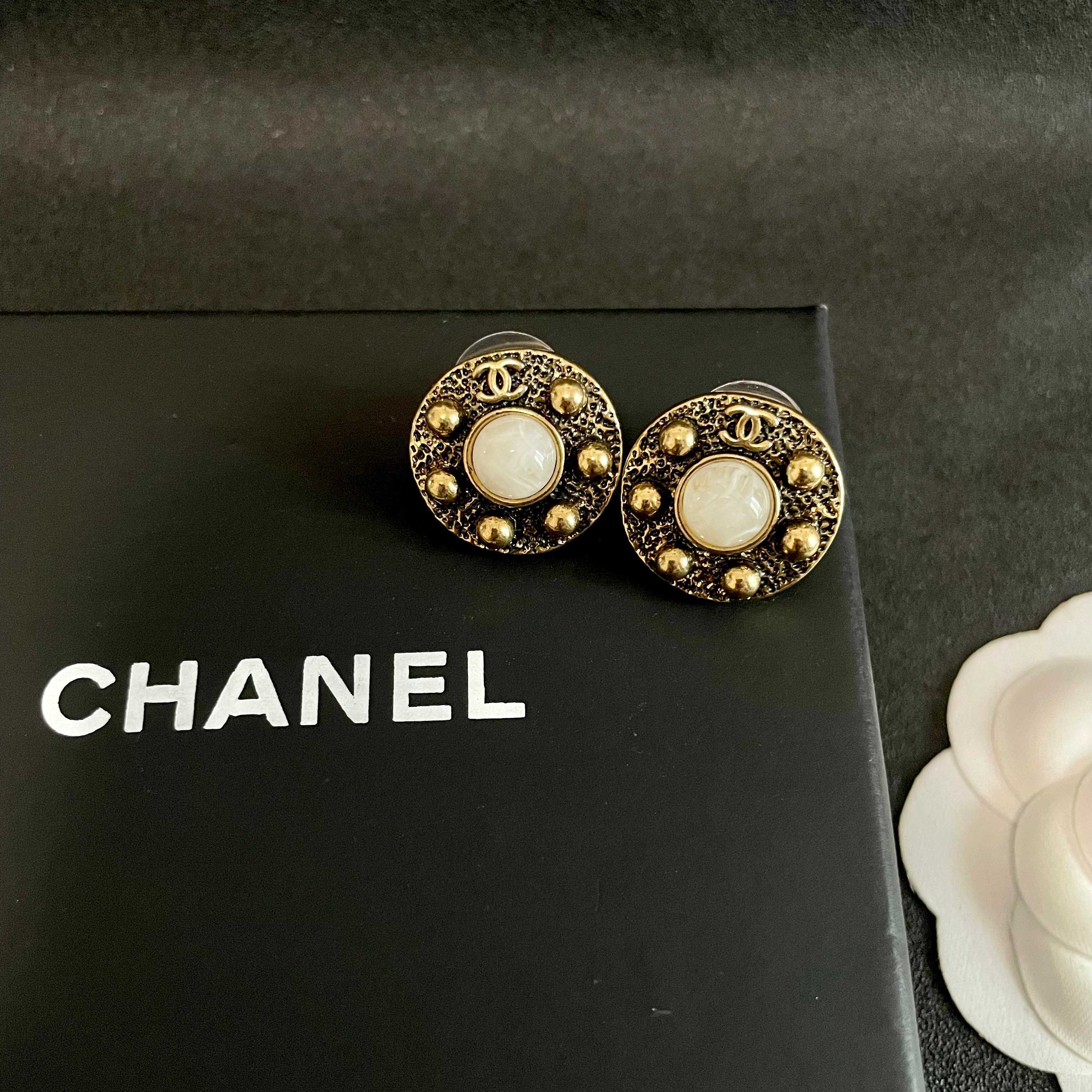 Chanel CC Logo Round Stud Earrings earrings antique gold metal white mother-of-pearl center stone 1 5cm diameter