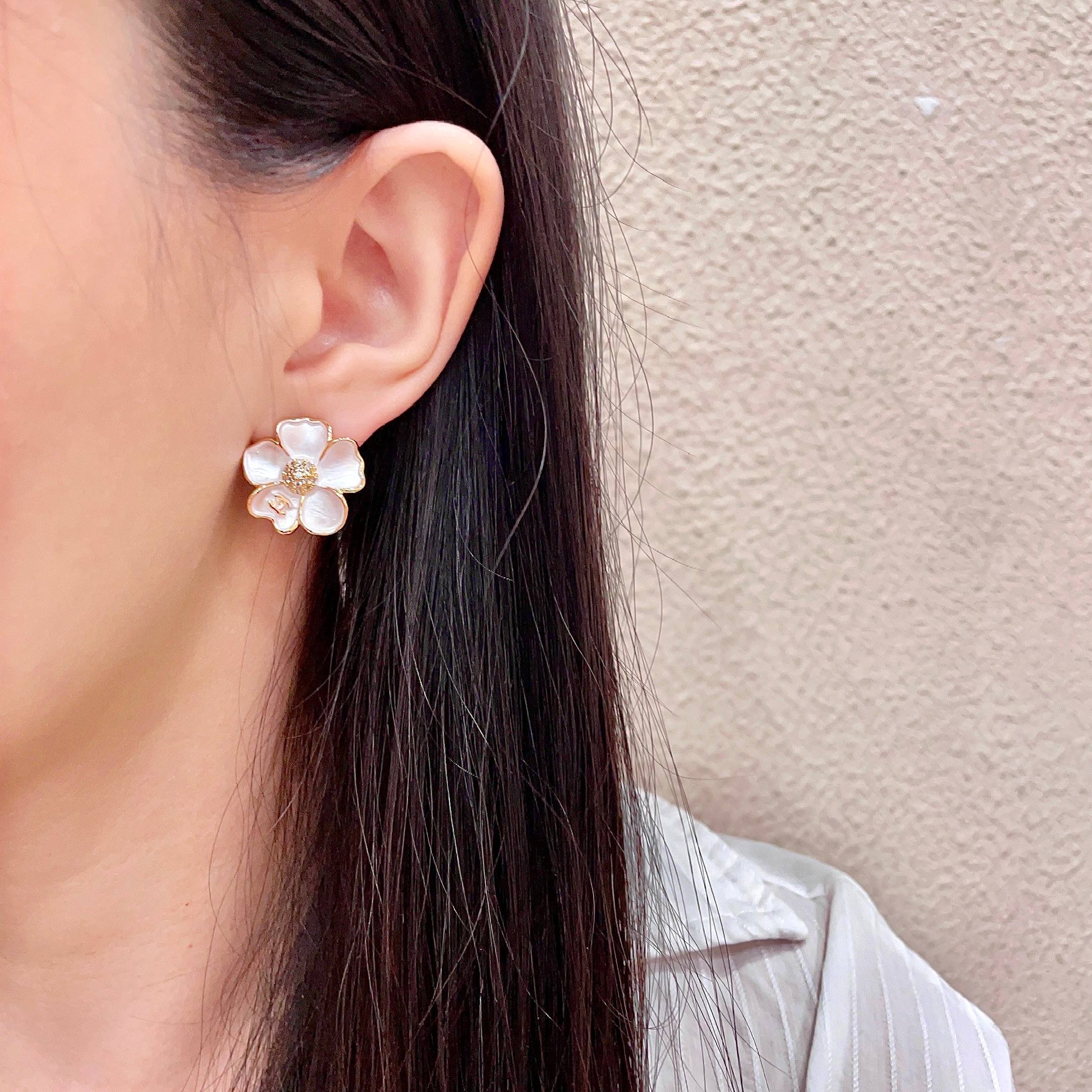 Chanel CC Camellia Flower Stud Earrings earrings Gold-tone metal white mother-of-pearl effect petals clear crystal accents 1 5cm diameter
