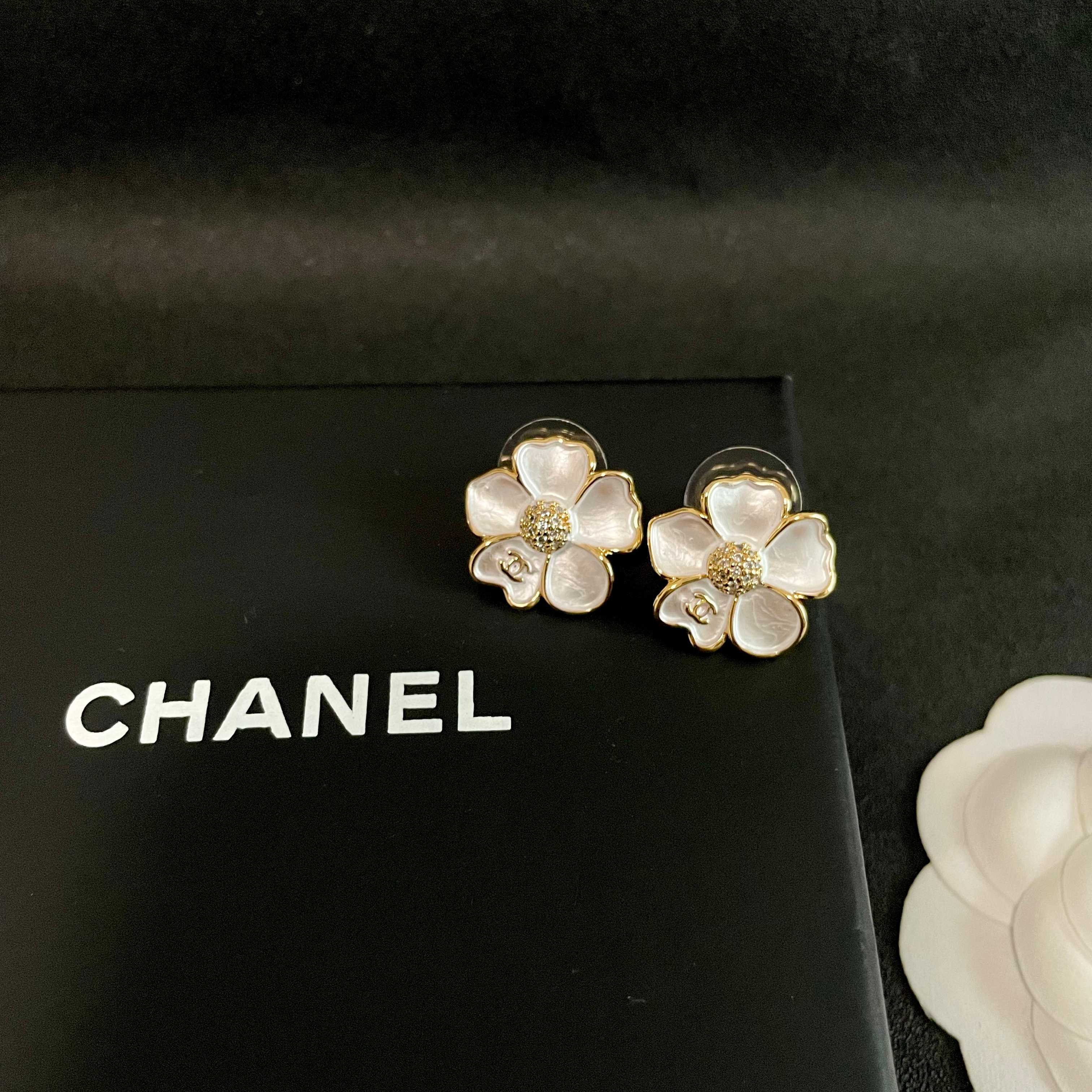 Chanel CC Camellia Flower Stud Earrings earrings Gold-tone metal white mother-of-pearl effect petals clear crystal accents 1 5cm diameter