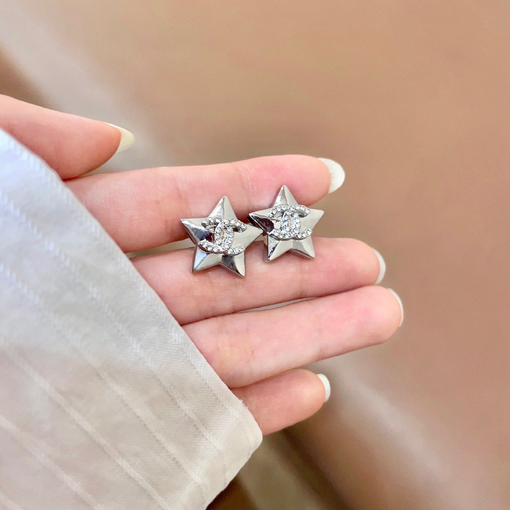Chanel CC Star Stud Earrings earrings Silver-toned metal with clear crystal accents One Size