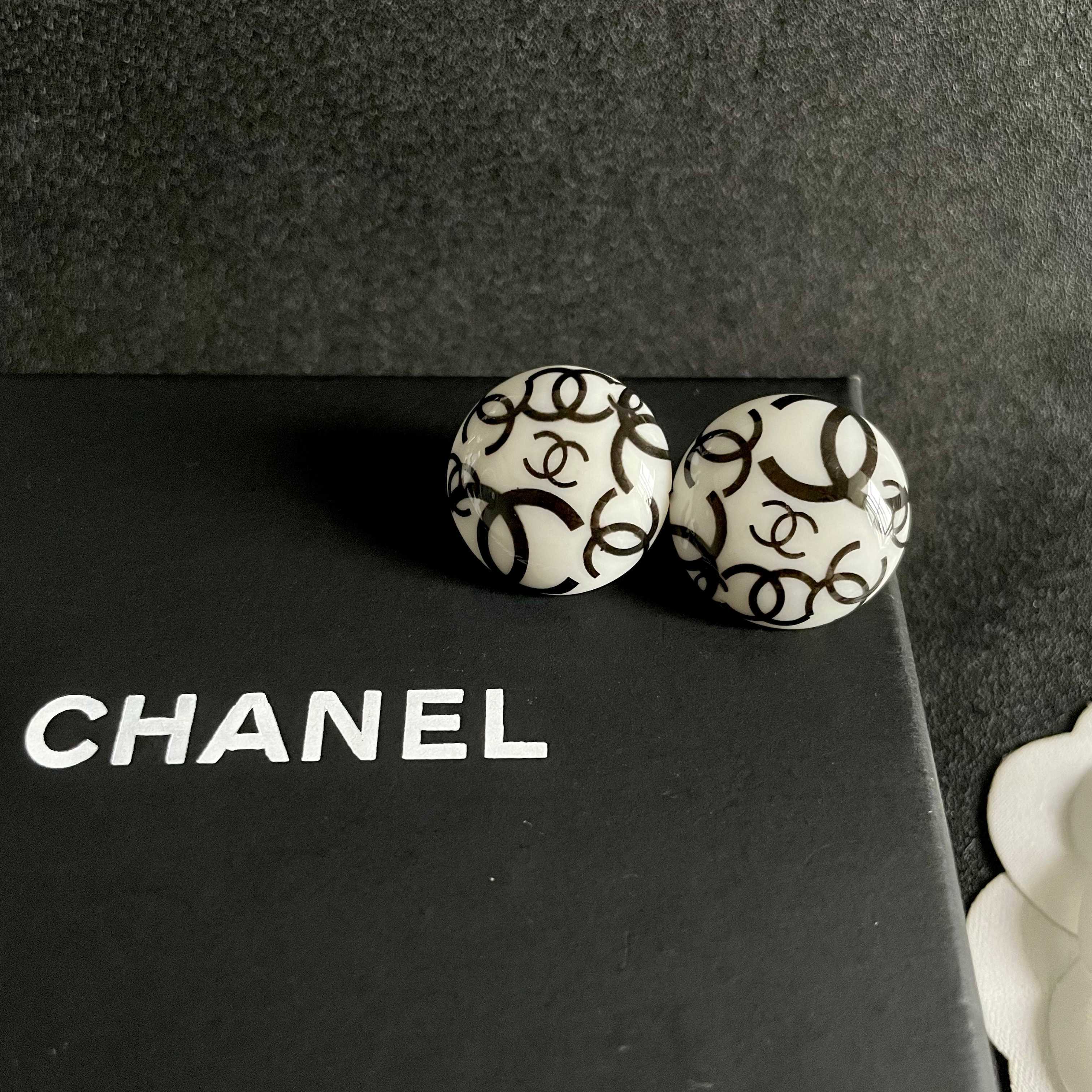 Chanel CC Logo Round Stud Earrings earrings white resin base with black interlocking CC logo detailing 2cm diameter