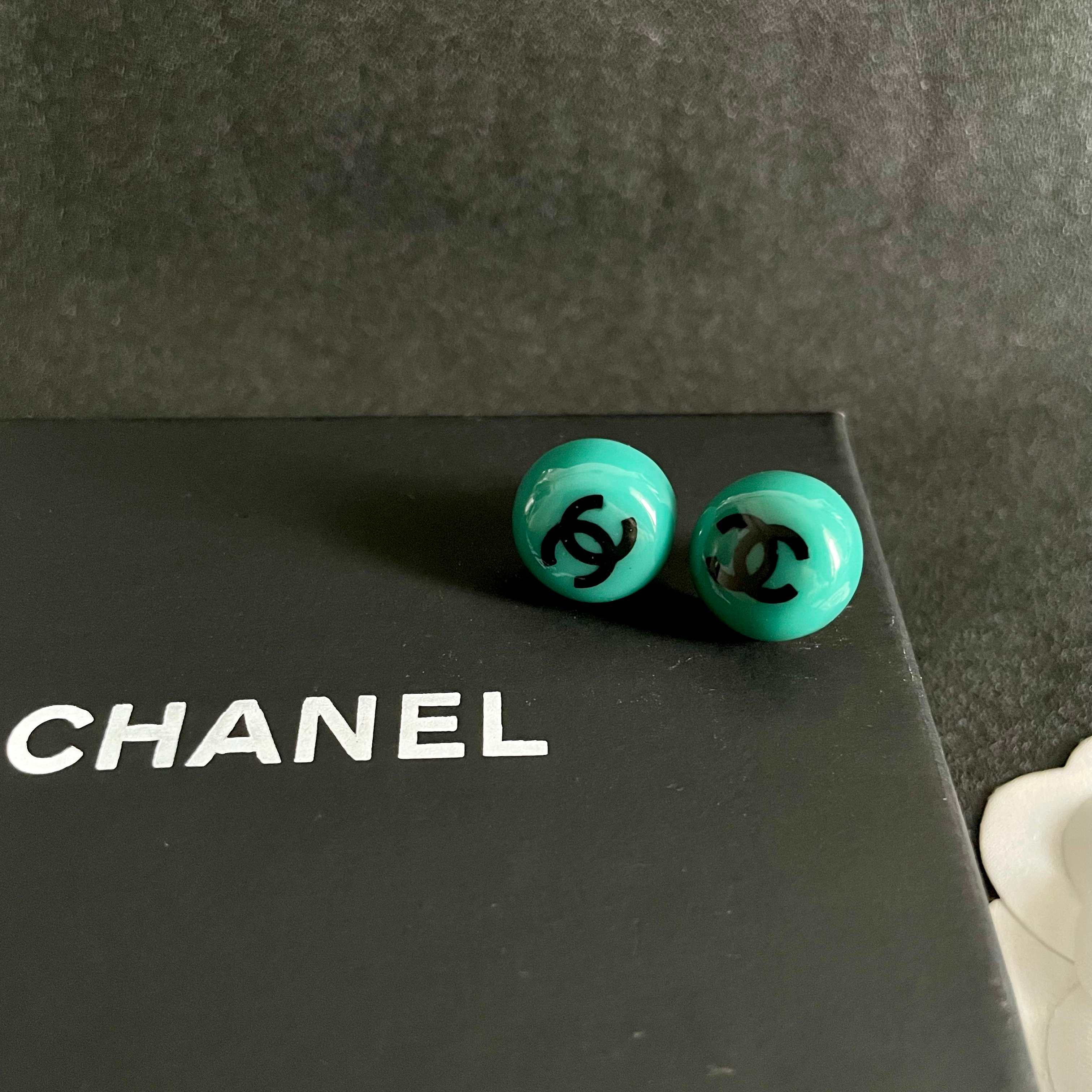 Chanel CC Logo Round Stud Earrings earrings Turquoise resin with black interlocking CC logo silver-toned metal hardware 1 2cm diameter